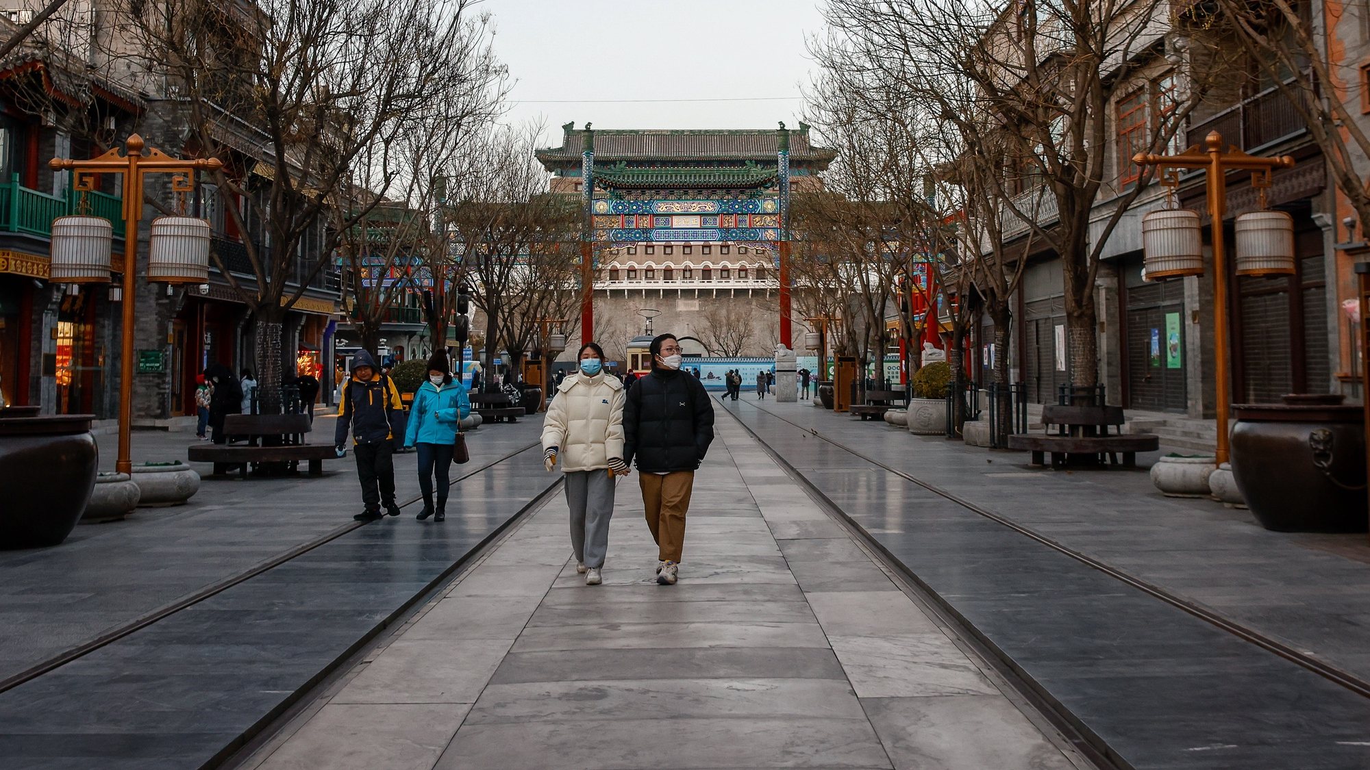 epa10392137 People walk along a shopping district in Beijing, China, 06 January 2023. China defended its COVID-19 reporting transparency after the World Health Organization (WHO) said Beijing was under-reporting deaths. Spokesman for Beijing&#039;s Washington Embassy, Liu Pengyu said &#039;China has always shared information and data responsibly with the international community&#039;. COVID-19 continues to surge across the country as several countries have imposed restrictions for travelers coming from China.  EPA/MARK R. CRISTINO