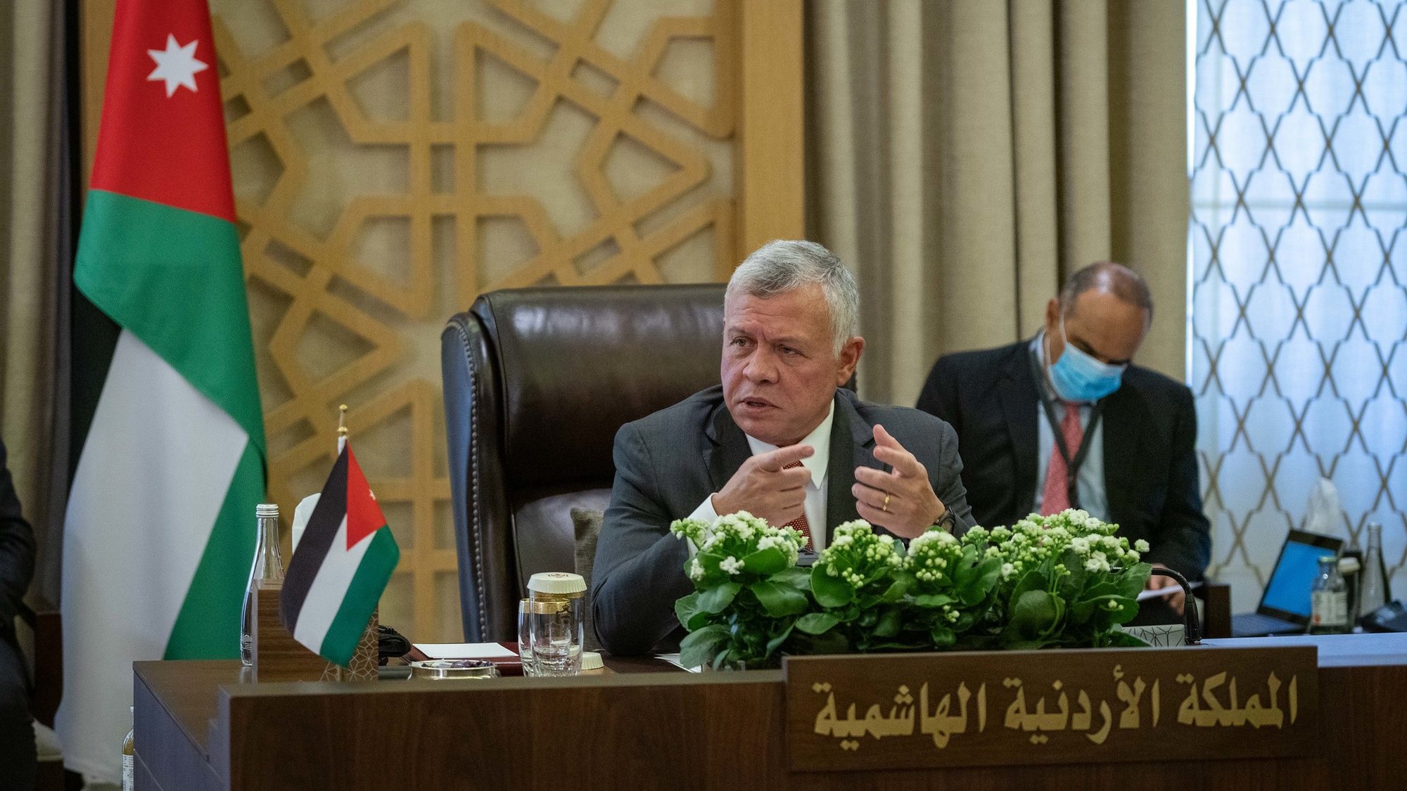 epa08624880 A handout photo made available by Royal Hashemite Court RHC shows King Abdullah II of Jordan talking during a trilateral meeting in Amman, Jordan, 25 August 2020.  EPA/ROYAL HASHEMITE COURT HANDOUT  HANDOUT EDITORIAL USE ONLY/NO SALES