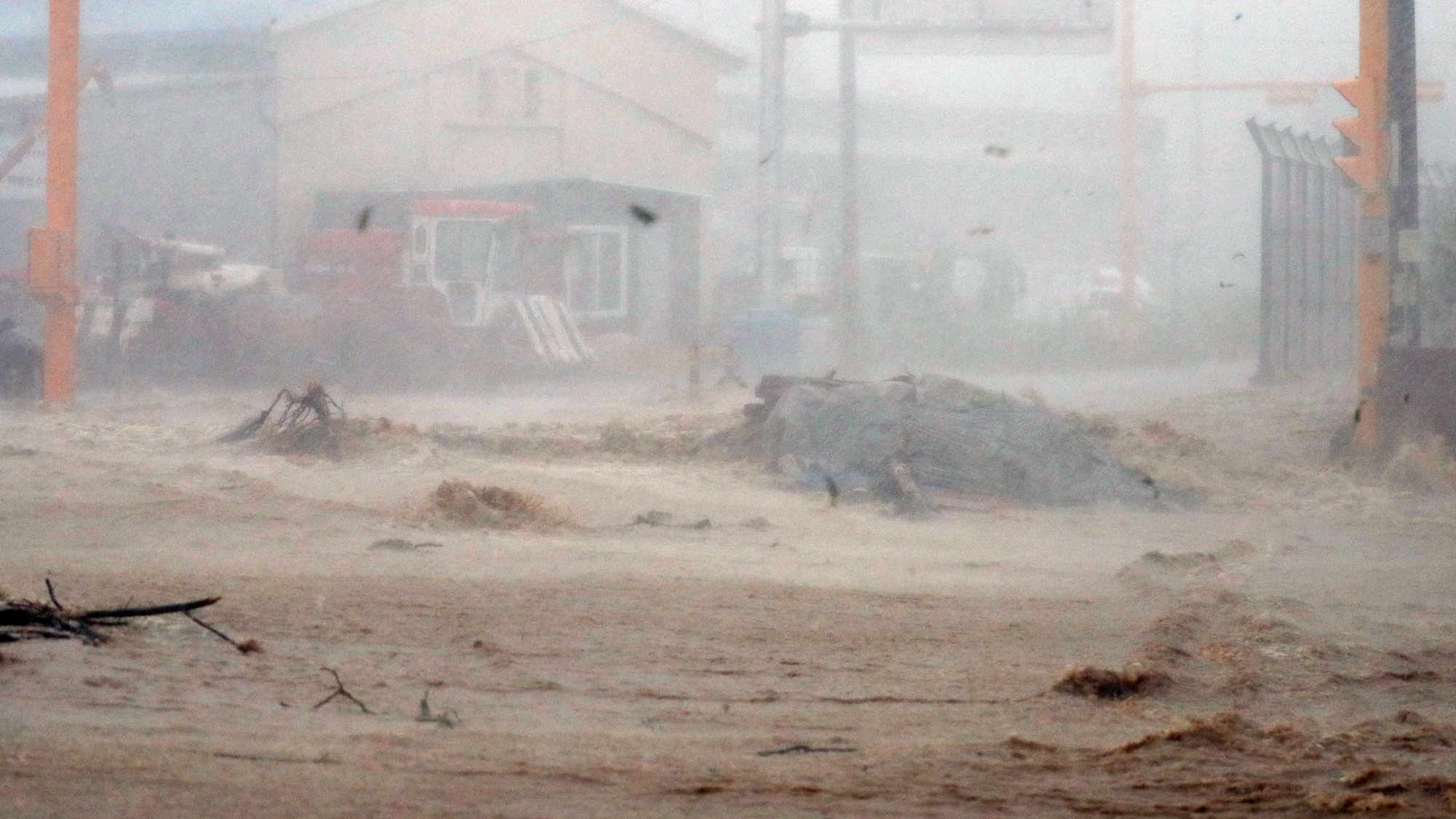 epa10162788 A road is inundated after Typhoon Hinnamnor made landfall on the southern coast of South Korea, in Pohang, South Korea, 06 September 2022.  EPA/YONHAP SOUTH KOREA OUT