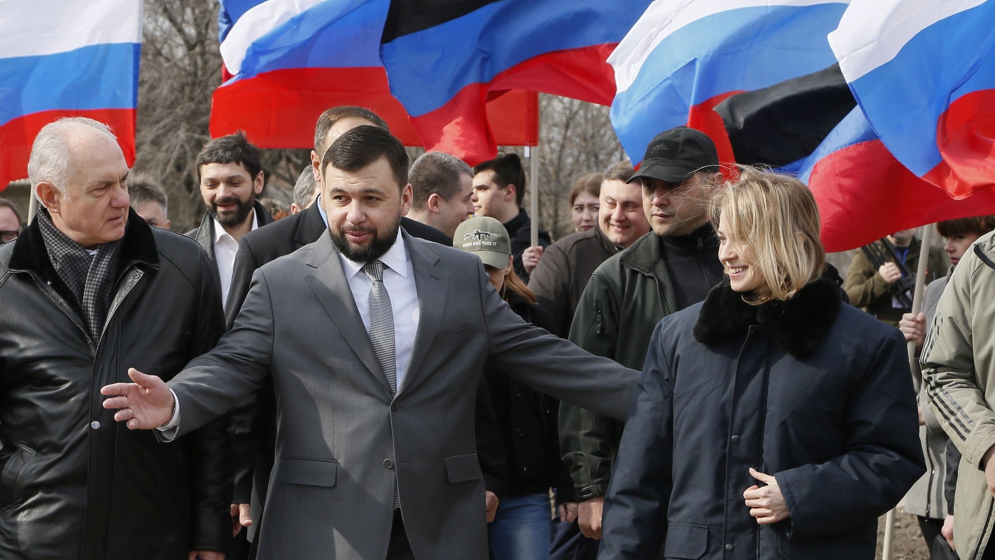 epa07456360 Natalia Poklonskaya (R), member of Russian parliament and former Crimean Prosecutor Chief and Denis Pushilin (L), the head of the self-proclaimed Donetsk People&#039;s Republic (DNR) take part in unveiling ceremony of commemorative plate dedicated to 5th anniversary of Russian Spring and annexation of Crimea in the separatist-held Makeevka city in Donetsk area, Ukraine, 22 March 2019.  EPA/DAVE MUSTAINE