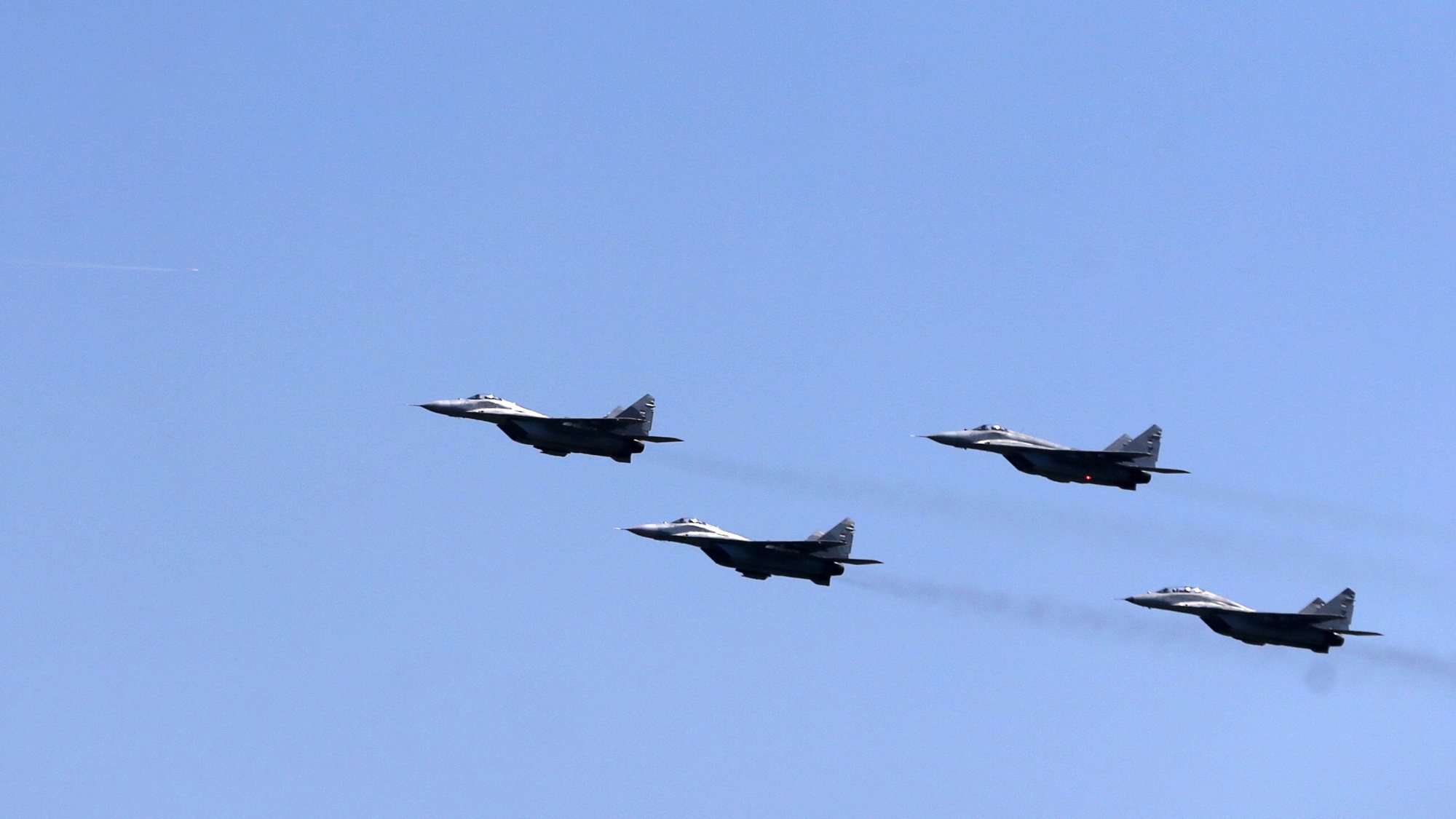 epa10585792 Serbian Air Force Mig-29 airplanes perform a flyby during the Serbian Armed Forces capabilities demonstration &#039;Granit 2023&#039; at the Batajnica military airport near Belgrade, Serbia, 22 April 2023. The capabilities presentation was arranged on the occasion of the Serbian Armed Forces Day, that is annually marked on 23 April. It marks the begin of the Second Serbian Uprising in 1815 which is regarded &#039;a milestone in the creation of the modern Serbian state and military&#039;.  EPA/ANDREJ CUKIC