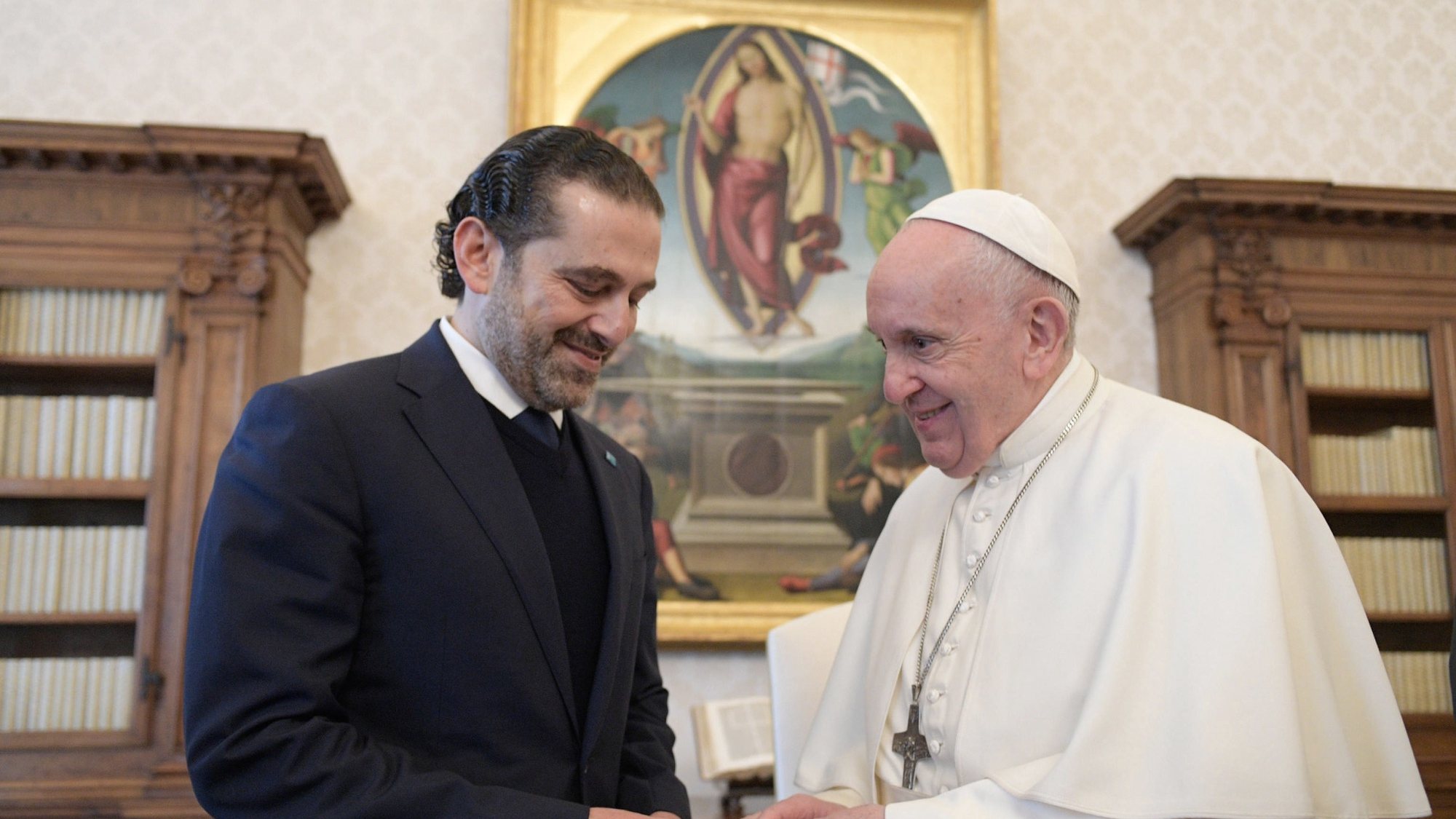epa09152267 A handout picture provided by the Vatican Media shows Pope Francis receiving the Prime Minister designate of Lebanon, Saad Hariri (L), during a private audience at the Vatican, 22 April 2021.  EPA/VATICAN MEDIA HANDOUT  HANDOUT EDITORIAL USE ONLY/NO SALES