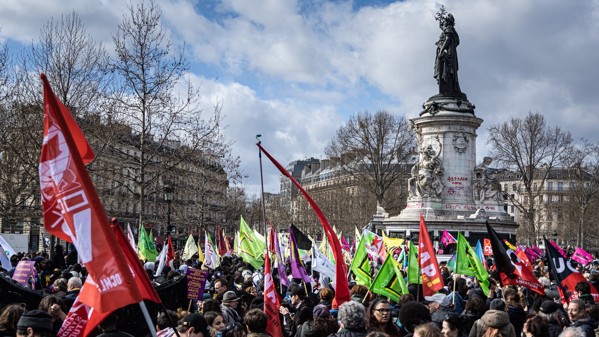 epa10542804 Thousands of people take part in a demonstration against a bill of the French Minister of the Interior Darmanin on immigration between Republique square and Bastille square in Paris, France, 25 March 2023. Human Rights activists and  immigrants  ask for a better regulation for immigration and regularisation of the undocumented workers.  EPA/CHRISTOPHE PETIT TESSON