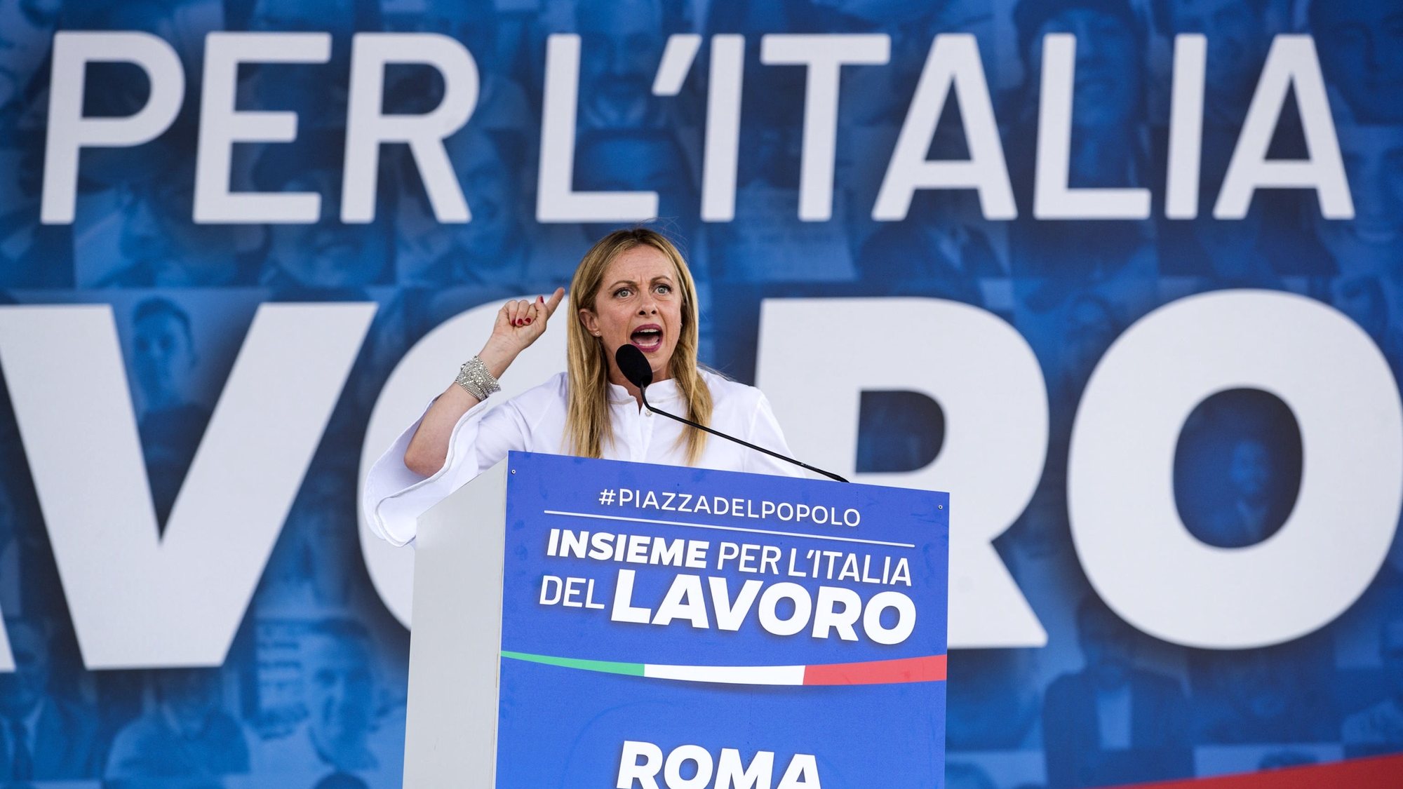 epa08526177 The leader of the right-populist Fratelli d&#039;Italia (&#039;Brothers of Italy&#039;) party, Giorgia Meloni, speaks at a joint rally staged by Italy&#039;s three main right-wing parties (Liga, Brothers of Italy and Forza Italia) at the Piazza del Popolo (&#039;People&#039;s Square&#039;) in downtown Rome, Italy, 04 July 2020.  EPA/ANGELO CARCONI