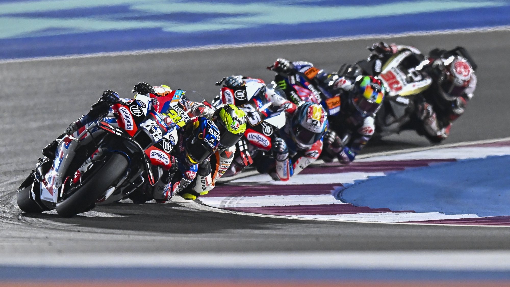 epa11209624 Portuguese MotoGP rider Miguel Oliveira of Trackhouse Racing leads the pack during the sprint race of the Motorcycling Grand Prix of Qatar, in Doha, Qatar, 09 March 2024. The season-opening 2024 Motorcycling Grand Prix of Qatar will be held on 10 March.  EPA/NOUSHAD THEKKAYIL