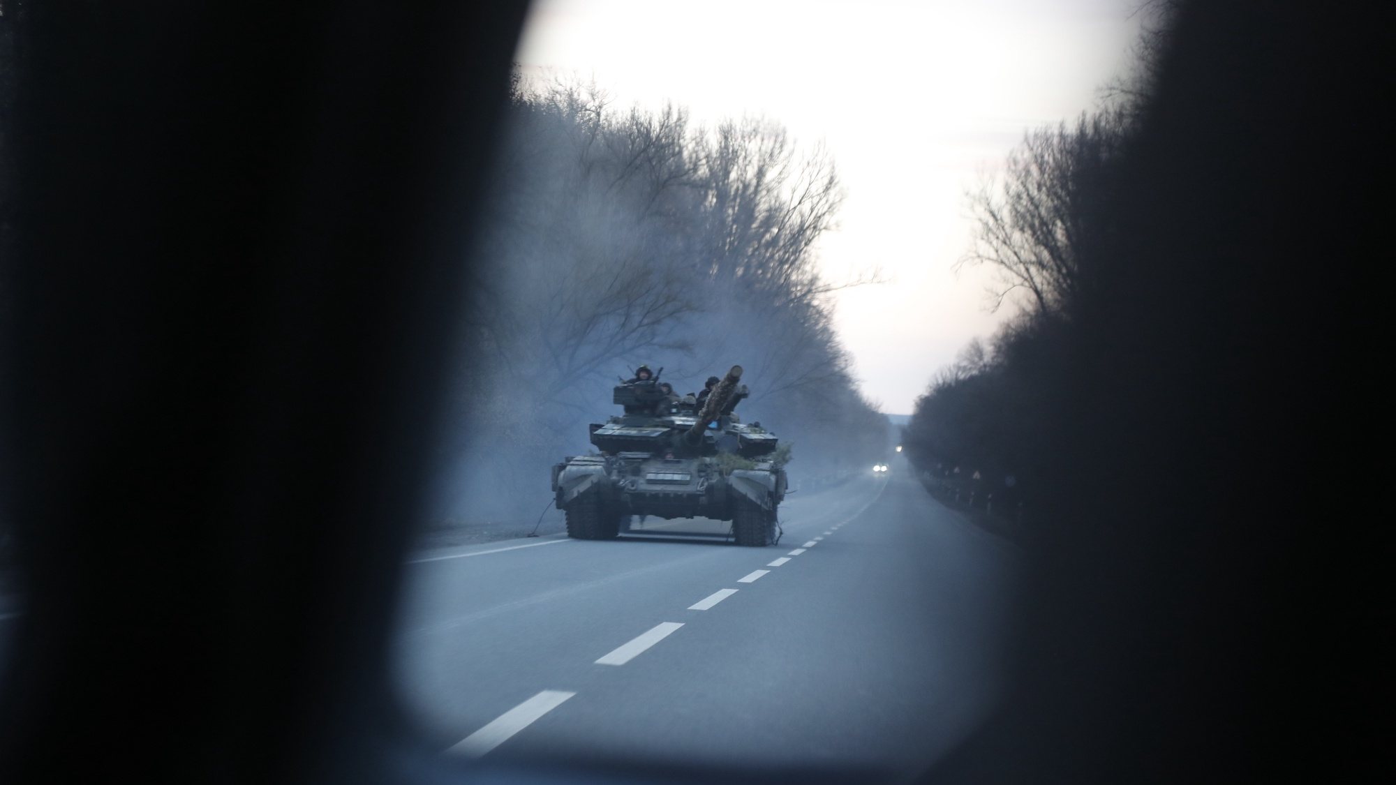 epaselect epa09783621 A Ukrainian tank moves near town of Kharkiv east of Ukraine 24 February 2022 (issued 25 February2022). Russian troops entered Ukraine on 24 February prompting the country&#039;s president to declare martial law.  EPA/ZURAB KURTSIKIDZE