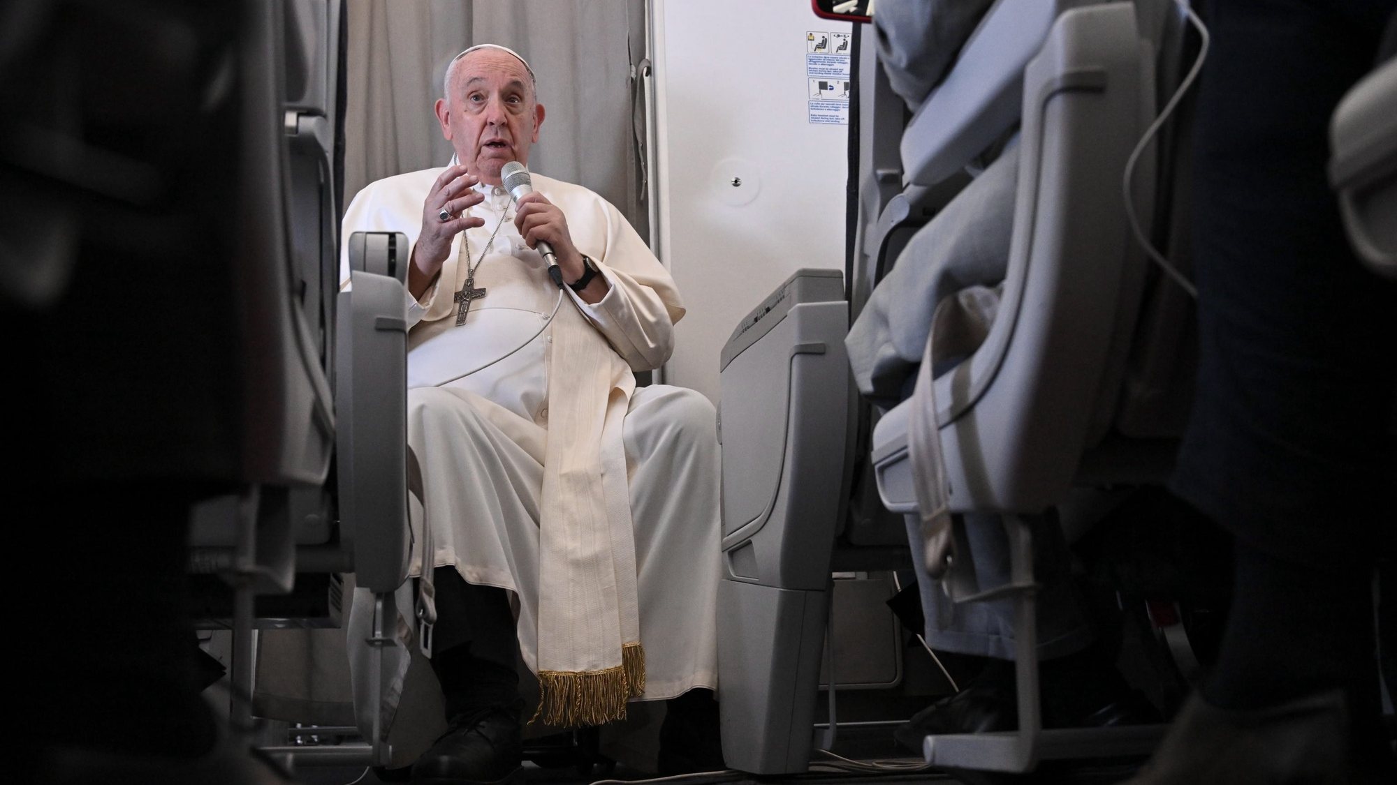 epa10449087 Pope Francis addresses the media while aboard the plane from Juba to Rome on 05 February 2023, returning from he Pope&#039;s visit to Democratic Republic of Congo and South Sudan.  EPA/TIZIANA FABI / POOL