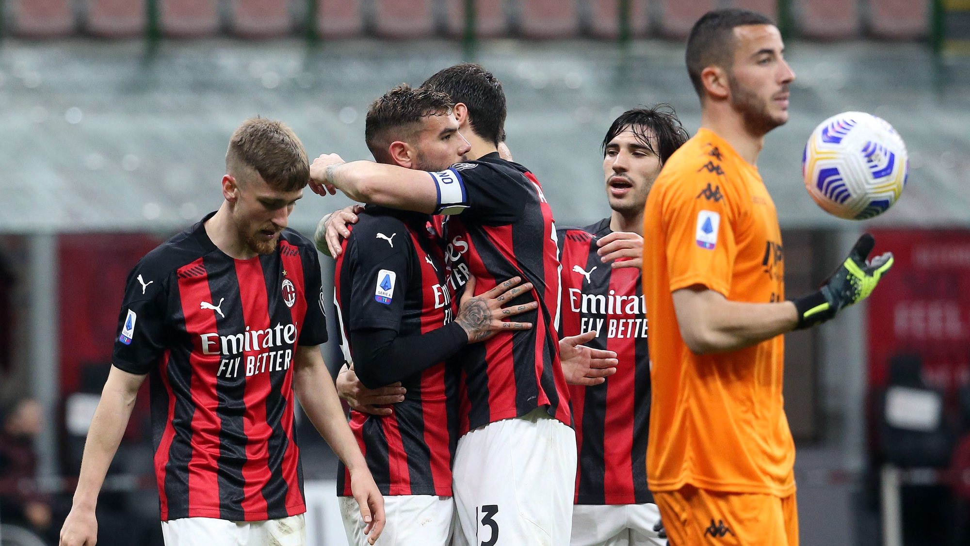 epa09172702 Milan&#039;s Theo Hernandez (2-L) celebrates with teammates after scoring the 2-0 lead during the Italian Serie A soccer match between AC Milan and Benevento Calcio at Giuseppe Meazza stadium in Milan, Italy, 01 May 2021.  EPA/MATTEO BAZZI