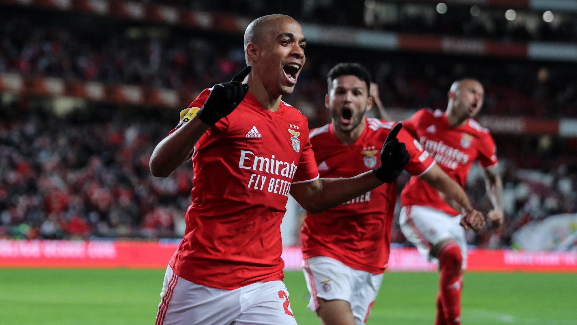 epa09676228 Benfica player Joao Mario celebrates after scoring a goal against Pacos de Ferreira during their Portuguese First League soccer match held at Luz Stadium, in Lisbon, Portugal, 9 January 2022.  EPA/MIGUEL A. LOPES