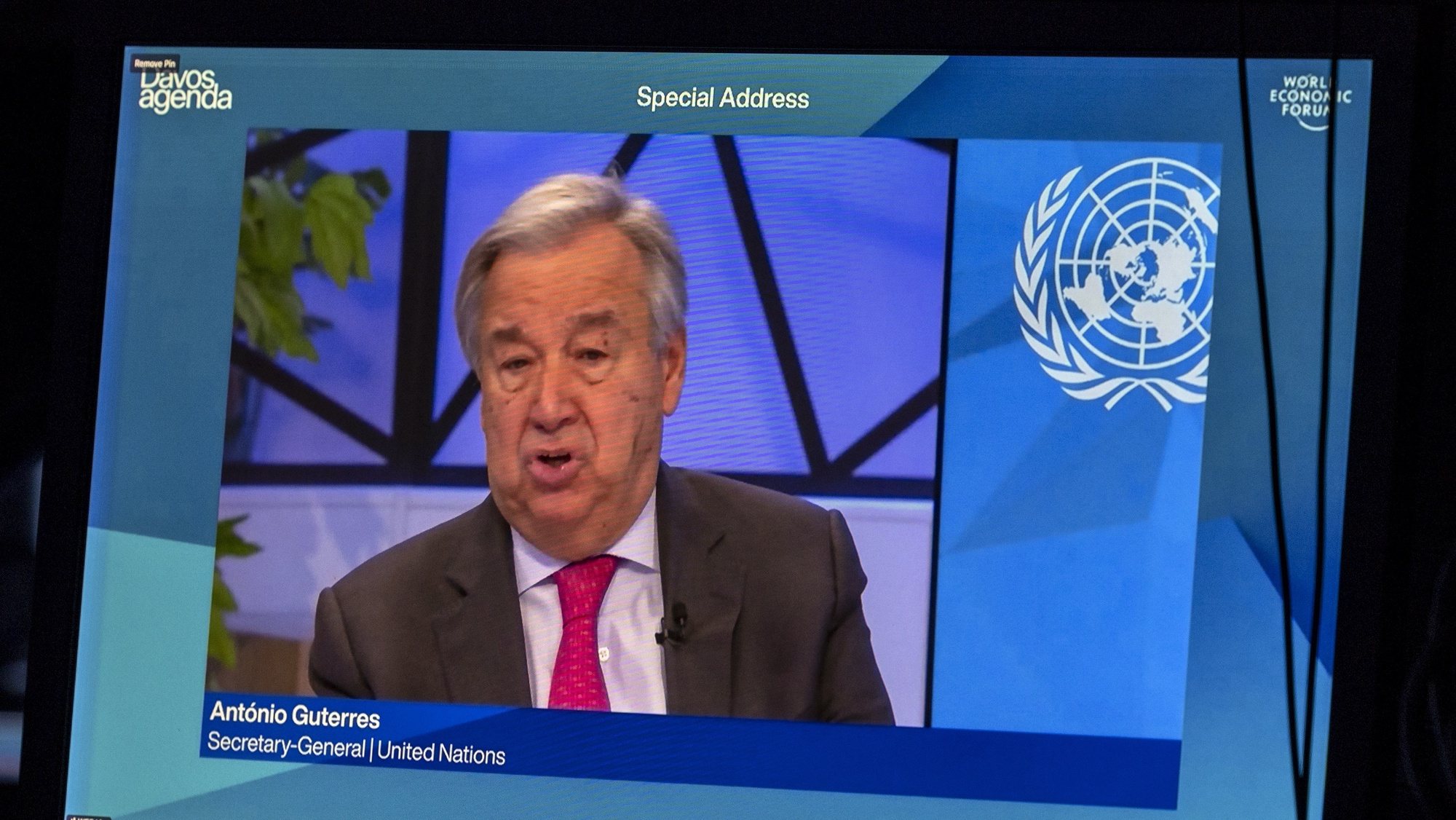 epa09691511 A screen shows the U.N. Secretary-General Antonio Guterres delivering his statement during the Davos Agenda 2022, in Cologny near Geneva, Switzerland, 17 January 2022. The Davos Agenda 2022 will be hosted virtually due to the Coronavirus pandemic. Global leaders will gather through a series of virtual plenaries to shape the principles, policies and partnerships needed in this challenging context.  EPA/SALVATORE DI NOLFI