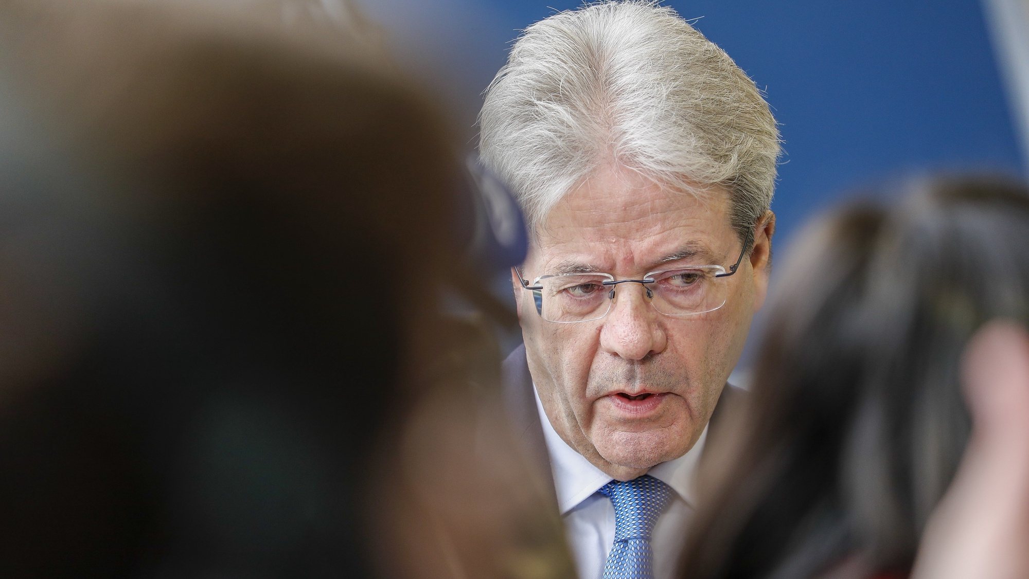epa09870114 European Commissioners in charge of Economy Paolo Gentiloni speaks to the media as he arrives for the Finance Ministers meeting in Luxembourg, 04 April 2022. Ministers will discuss economic developments resulting from the Russian invasion of Ukraine.  EPA/JULIEN WARNAND