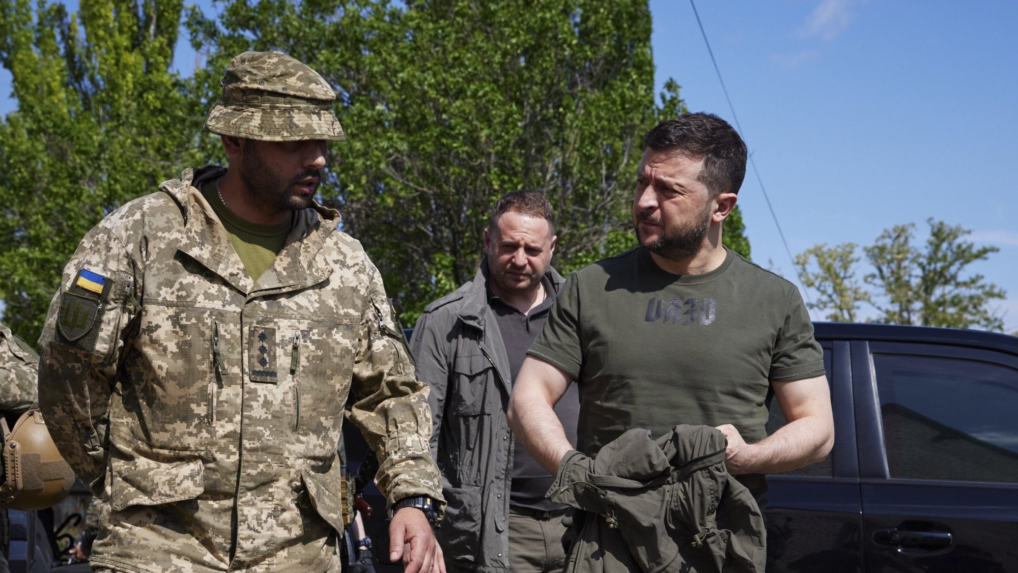 epa09998211 A handout picture made available by the presidential press service shows Ukrainian President Volodymyr Zelensky (R) speaking with servicemen during his visit to a frontline in the Zaporizhia area, Ukraine, 05 June 2022 amid the Russian invasion. Zelensky got himself updated on the operational situation at the line of defense. Russian troops had invaded Ukraine on 24 February, starting a conflict that provoked fighting, destruction and a humanitarian crisis since.  EPA/PRESIDENTIAL PRESS SERVICE HANDOUT HANDOUT  HANDOUT EDITORIAL USE ONLY/NO SALES
