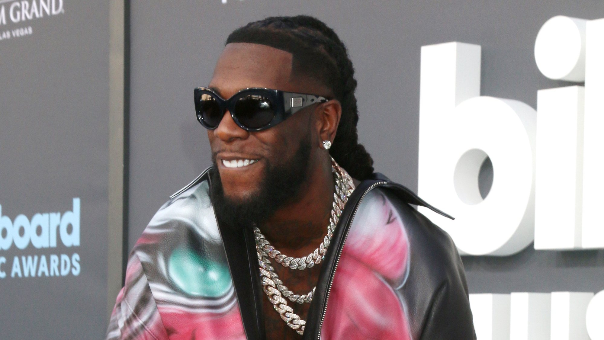 epa09950253 Burna Boy arrives for the 2022 Billboard Music Awards at the MGM Grand Garden Arena in Las Vegas, Nevada, USA, 15 May 2022. The Billboard Music Awards finalists are based on US year-end chart performance, sales, number of downloads and total airplay.  EPA/NINA PROMMER