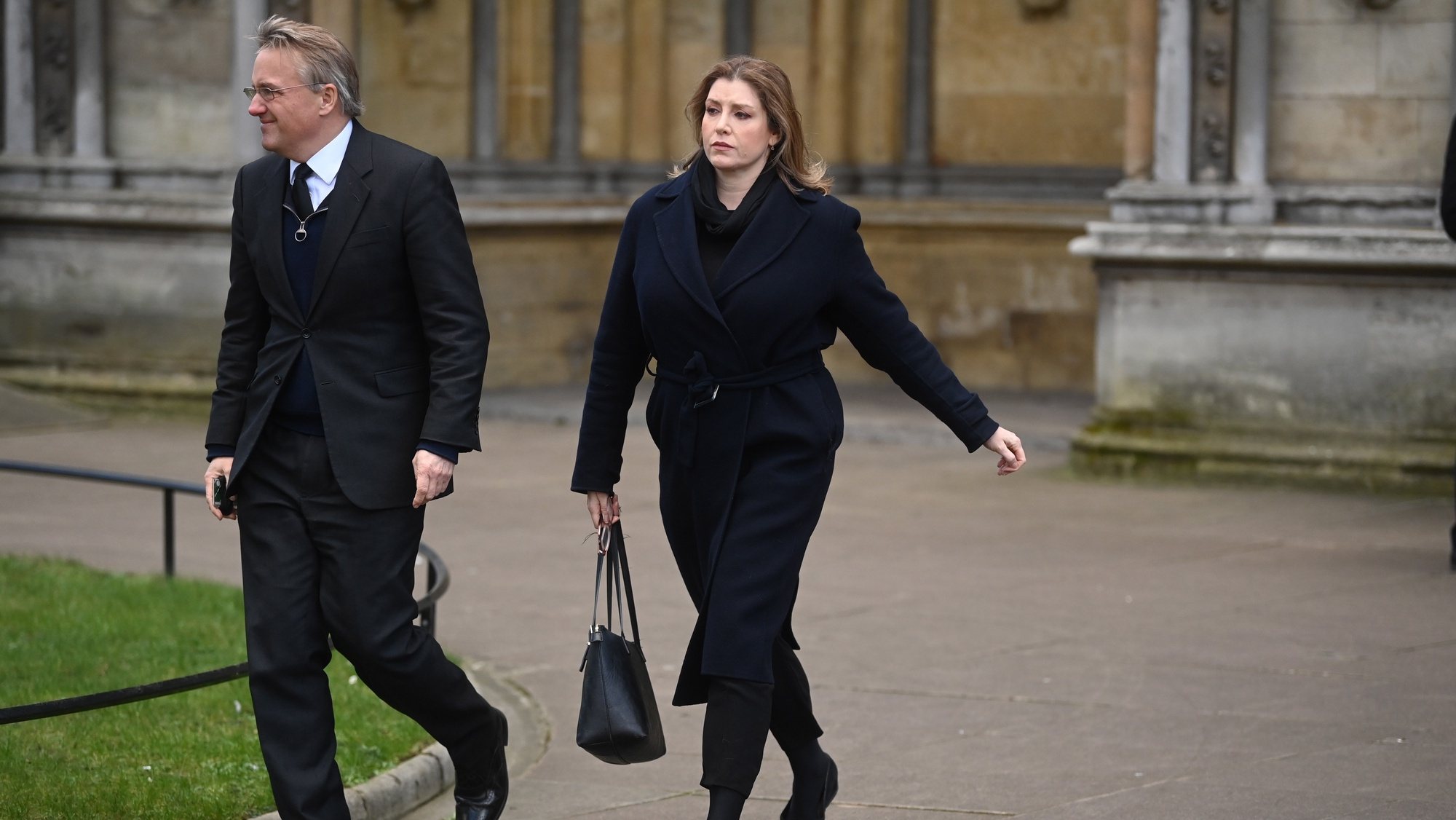 epa09720006 Conservative MP Penny Mordaunt (R) attends the funeral of Labour Party MP Jack Dromey at St Margret&#039;s Church in Westminster Abbey in London, Britain, 31 January 2022. Jack Dromey, was Member of Parliament for Birmingham Erdington and died at his flat in Birmingham on 07 January 2022.  EPA/NEIL HALL
