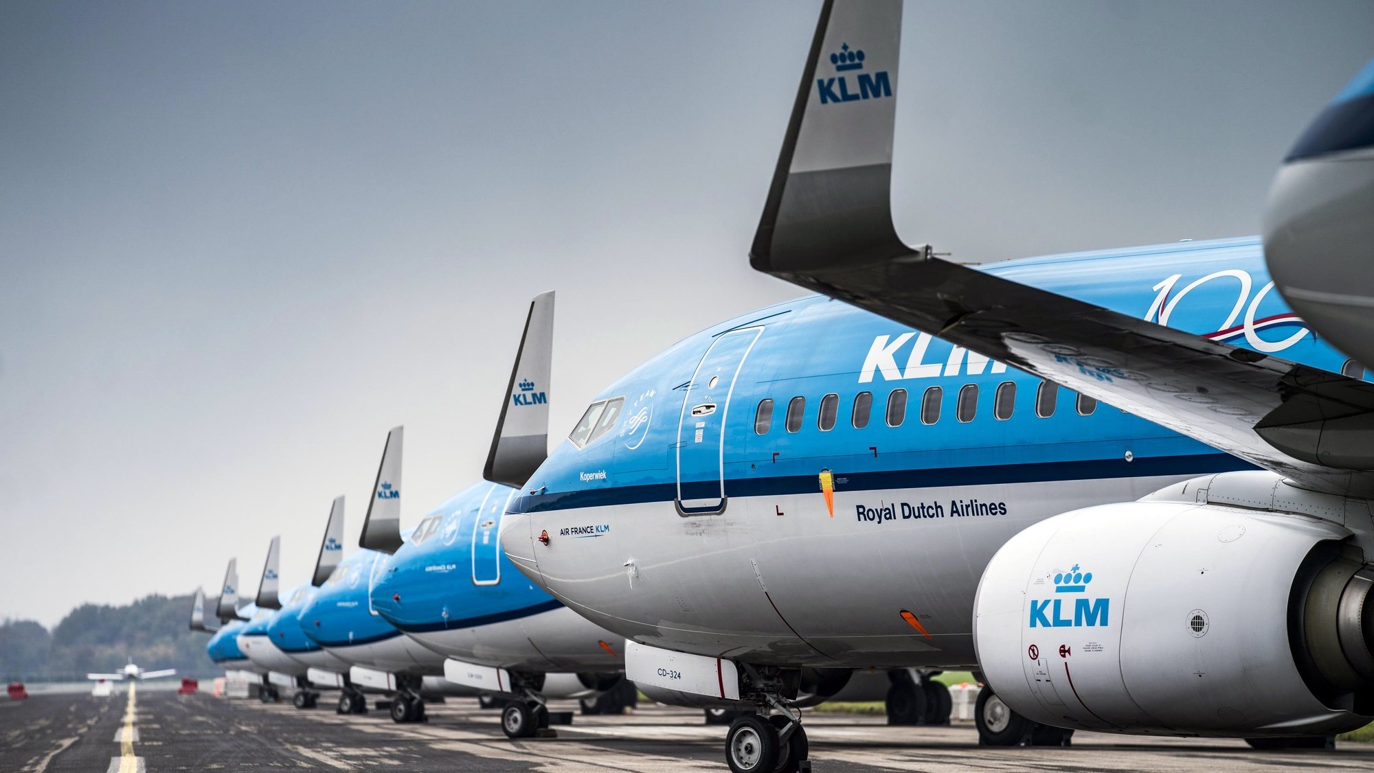 epa08809867 Twelve KLM passenger planes are grounded for the winter at Groningen Airport Eelde, the Netherlands, 09 November 2020.  EPA/SIESE VEENSTRA