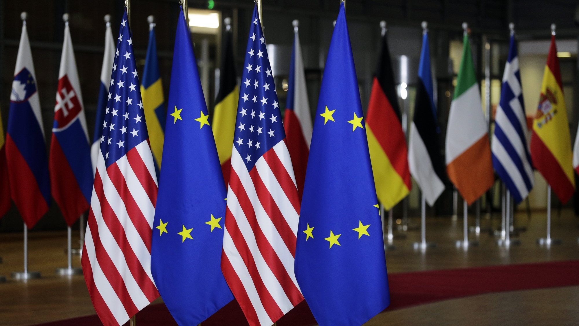 epa09847066 US and EU flags are set up for US president Joe Biden arrival for a European Council Summit in Brussels, Belgium, 24 March 2022. The European Council summit starts with the participation of US President Joe Biden to address Russia&#039;s ongoing military aggression against Ukraine. After that, Head of states will continue discussions on how best to support Ukraine in these dramatic circumstances.  EPA/OLIVIER HOSLET