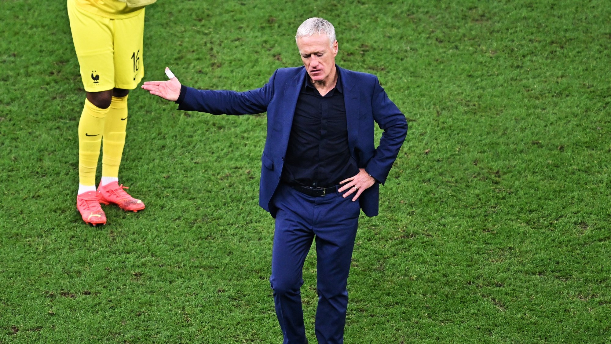 epa10372902 Head coach of France Didier Deschamps reacts after the FIFA World Cup 2022 Final between Argentina and France at Lusail stadium, Lusail, Qatar, 18 December 2022.  EPA/Noushad Thekkayil