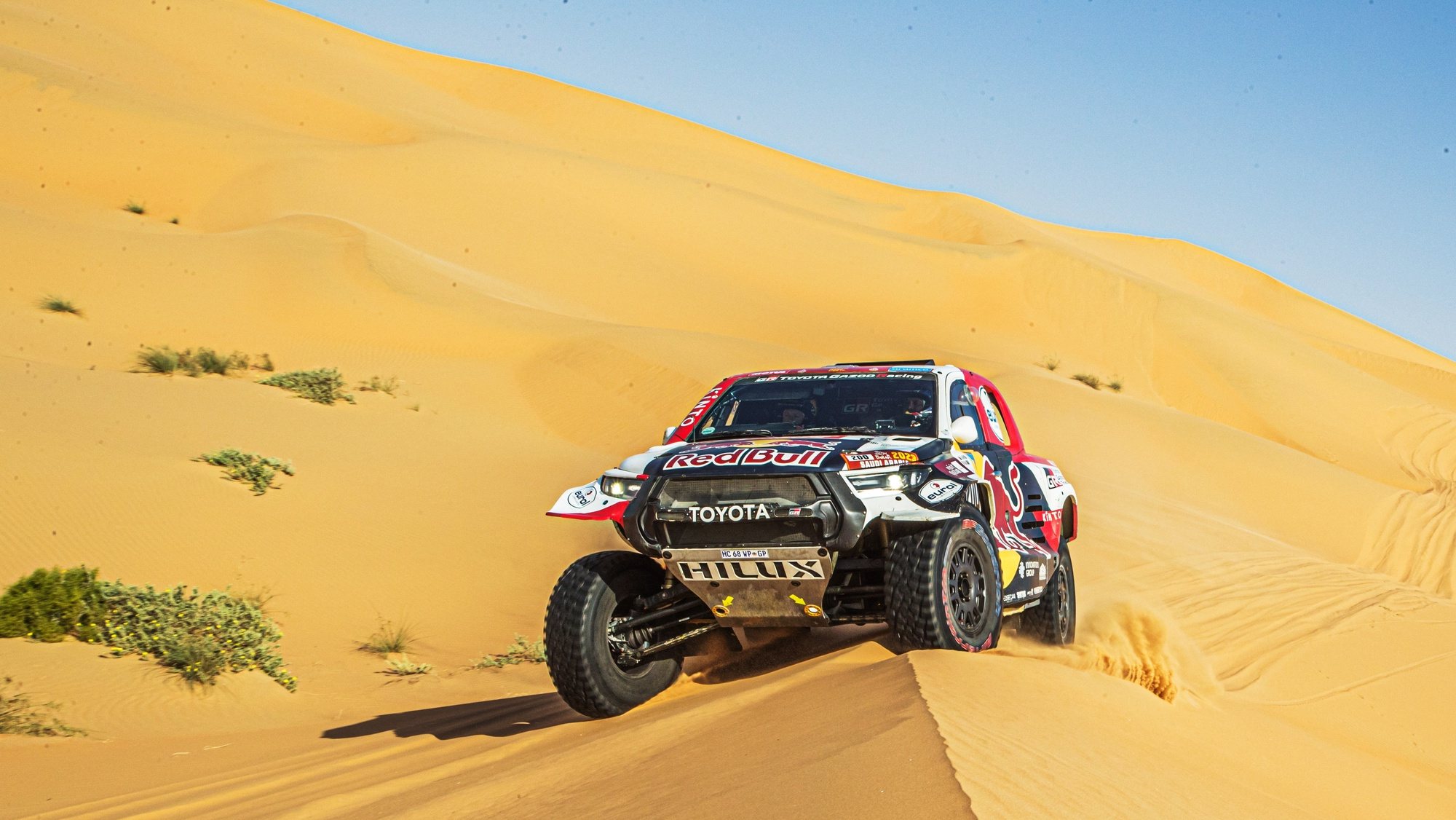epa10404711 Qatari driver Nasser Al-Attiyah and French co-driver Mathieu Baumel of Toyota Gazoo Racing in action in action during the 13th stage of the Dakar Rally 2023 from Shaybah to Al-Hofuf, Saudi Arabia, 14 January 2023.  EPA/Andrew Eaton