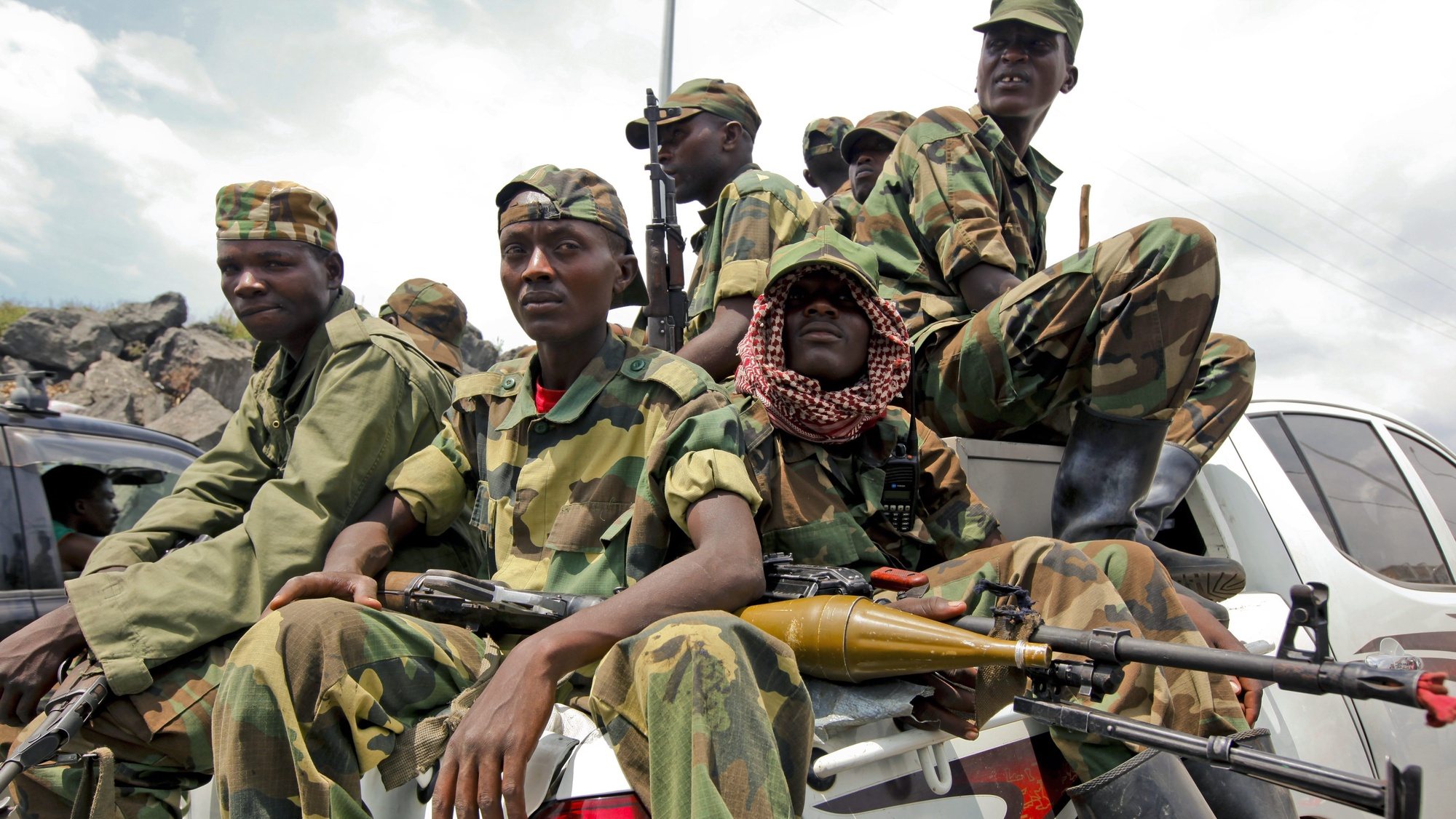 epa03936382 (FILES) A group of M23 rebel fighters sit on a pickup truck as they prepare to leave the city, in Goma, eastern Democratic Republic of Congo, 01 December 2012. The M23 rebel group in the eastern Democratic Republic of Congo is ending its insurgency, it was announced 05 November 2013. In a statement the movement said it would adopt &#039;purely political means&#039; to achieve its goals and urged its fighters to disarm and demobilise.  EPA/DAI KUROKAWA *** Local Caption *** 50618534