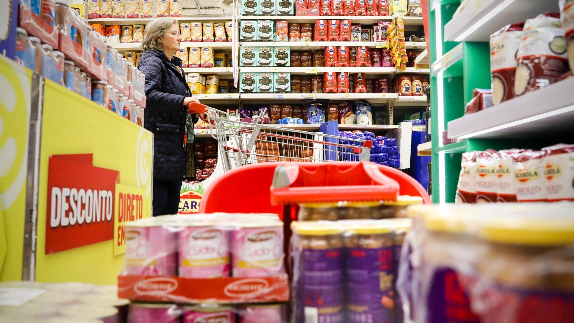 A woman shopping in a supermarket as many people are stocking essential goods due to Covid-19 epidemic, Porto, Portugal, 12th March 2020. The number of Covid-19 infected people has raised from 59 to 78, 69 of them are hospitalized.  JOSE COELHO/LUSA