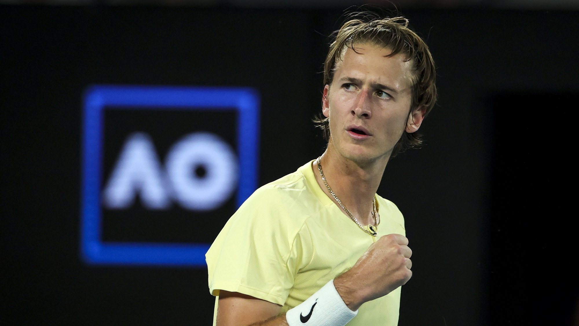 epa10425947 Sebastian Korda of the USA reacts after a point against Karen Khachanov of Russia during their quarterfinal match at the Australian Open tennis tournament in Melbourne, Australia, 24 January 2023.  EPA/FAZRY ISMAIL