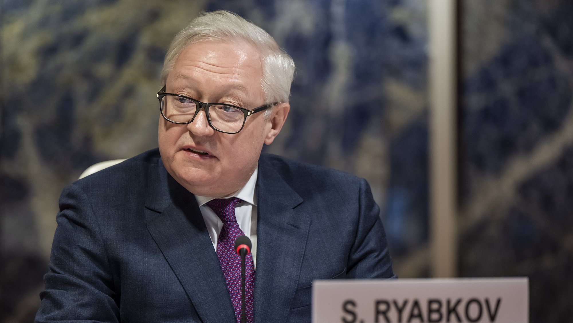 epa10498429 Deputy Minister of Foreign Affairs of the Russian Federation Sergei Ryabkov delivers his speech during a session of the Conference on Disarmament at the European headquarters of the United Nations in Geneva, Switzerland, 02 March 2023.  EPA/MARTIAL TREZZINI