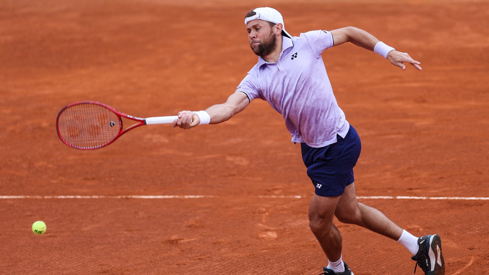 Radu Albot from Moldova in action against Sebastian Baez from Argentina in the round of 32 match at the Estoril Open Tennis tournament in Estoril, on the outskirts of Lisbon, Portugal, 03 of April 2023. MIGUEL A. LOPES/LUSA
