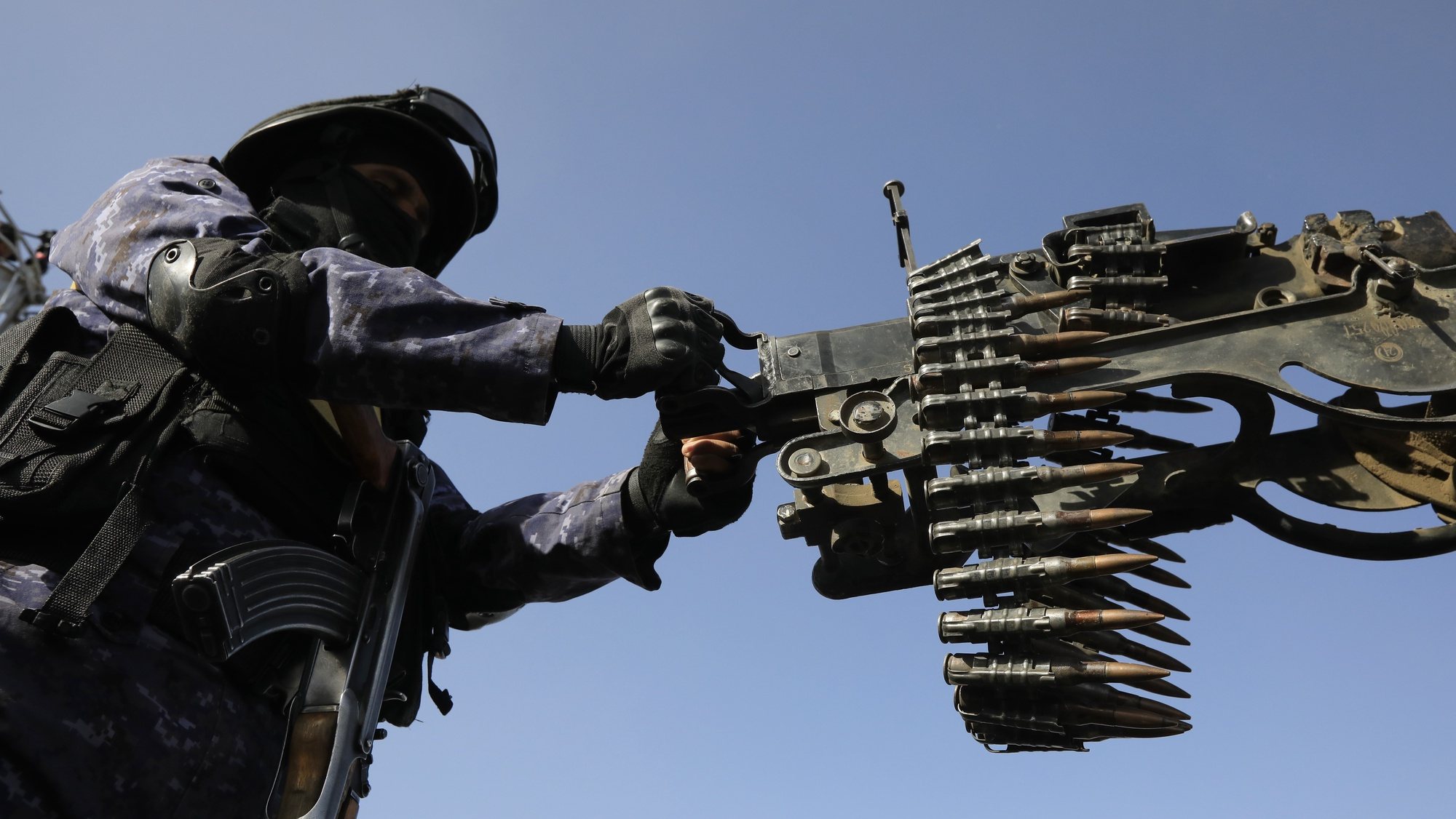epa11071861 A Houthi soldier stands behind a machine gun on a vehicle while patrolling during a protest against a multinational operation to safeguard Red Sea shipping following US and UK airstrikes on Houthis military sites, in Sana&#039;a, Yemen, 12 January 2024. According to the Houthis military spokesman Yahya Sarea, five Houthi fighters were killed and six others wounded in a total of 73 airstrikes carried out by the United States and the United Kingdom against several Houthis-controlled sites in Yemen in response to Houthis attacks in the Red Sea. The US Department of Defense had announced in December 2023 a multinational operation to safeguard trade and to protect ships in the Red Sea amid the recent escalation in Houthi attacks. Houthis vowed to attack Israeli-bound ships and prevent them from navigating in the Red Sea and the Bab al-Mandab Strait in retaliation for Israel&#039;s airstrikes on the Gaza Strip, according to Sarea.  EPA/YAHYA ARHAB