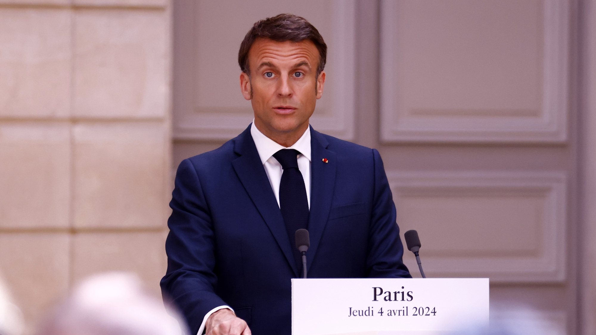epa11258655 French President Emmanuel Macron delivers a speech during a press conference with the Austrian chancellor before their working lunch at Elysee Palace in Paris, France, 04 April 2024.  EPA/MOHAMMED BADRA / POOL