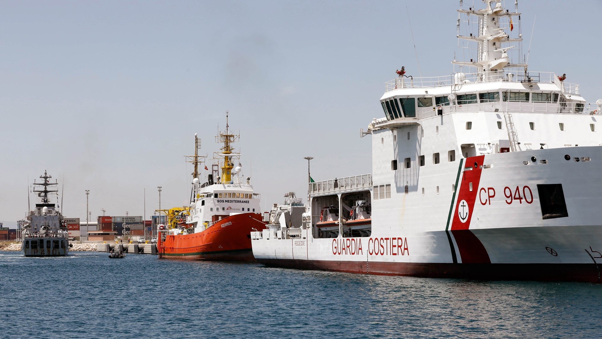 epa06815316 The Italian vessels &#039;Orione&#039; (L) and &#039;Dattilo&#039; (R) are seen at the port in Valencia, Spain, after escorting the rescue vessel &#039;Aquarius&#039; (C) to the Spanish coast, on 17 June 2018.The &#039;Aqarius&#039; rescue vessel of the European maritime-humanitarian organization &#039;SOS Mediterranee&#039; carrying some 630 migrants rescued in the Mediterranean off the Libyan coast has been heading to Spain after both, Malta and Italy, had refused the ship to enter either country&#039;s ports.  EPA/JUAN CARLOS CARDENAS