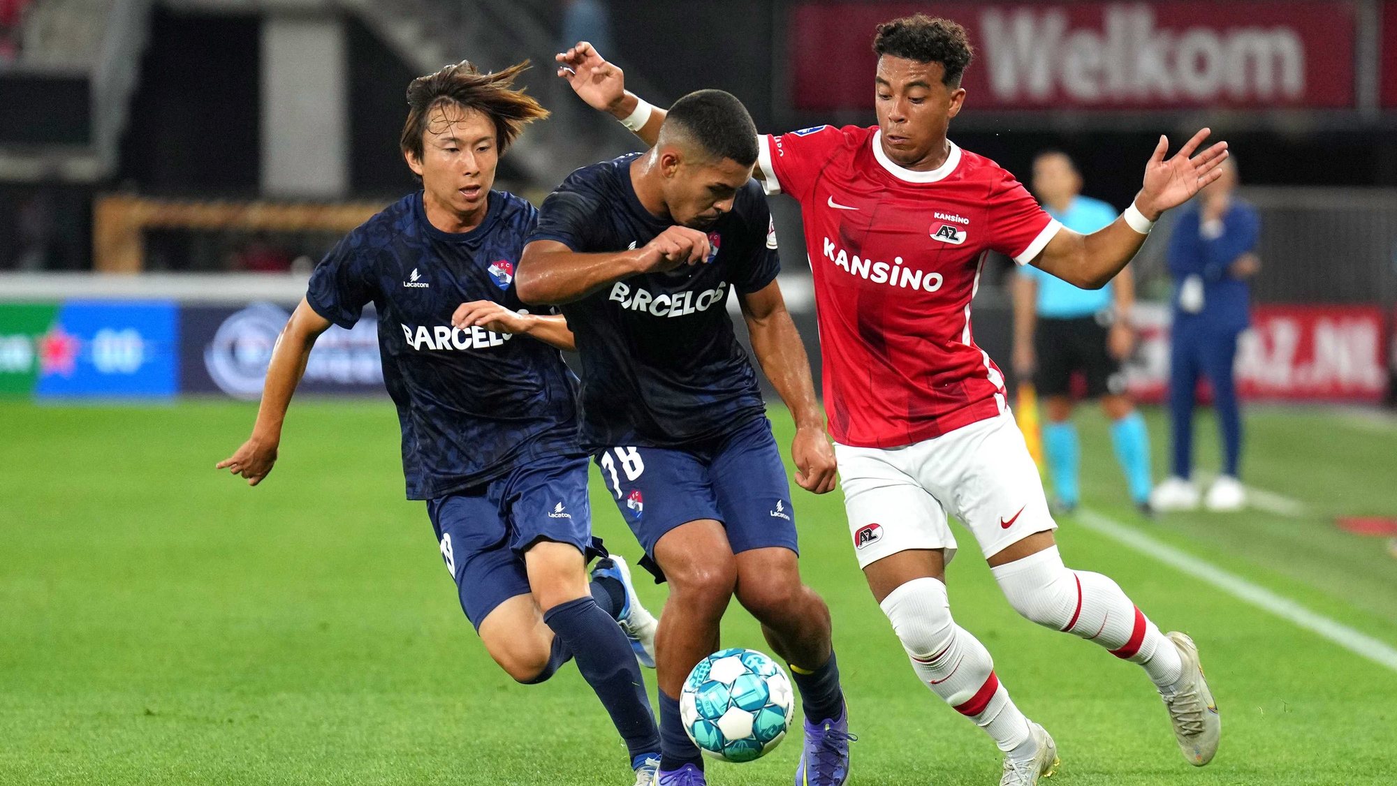 epa10128149 (L-R) Kanya Fujimoto of Gil Vicente FC, Myron van Brederode of AZ, Danilo Veiga or Gil Vicente FC during the UEFA Conference League play-off match between AZ Alkmaar and Gil Vicente FC at the AFAS stadium in Alkmaar, The Netherlands, 18 August 2022.  EPA/Ed van de Pol