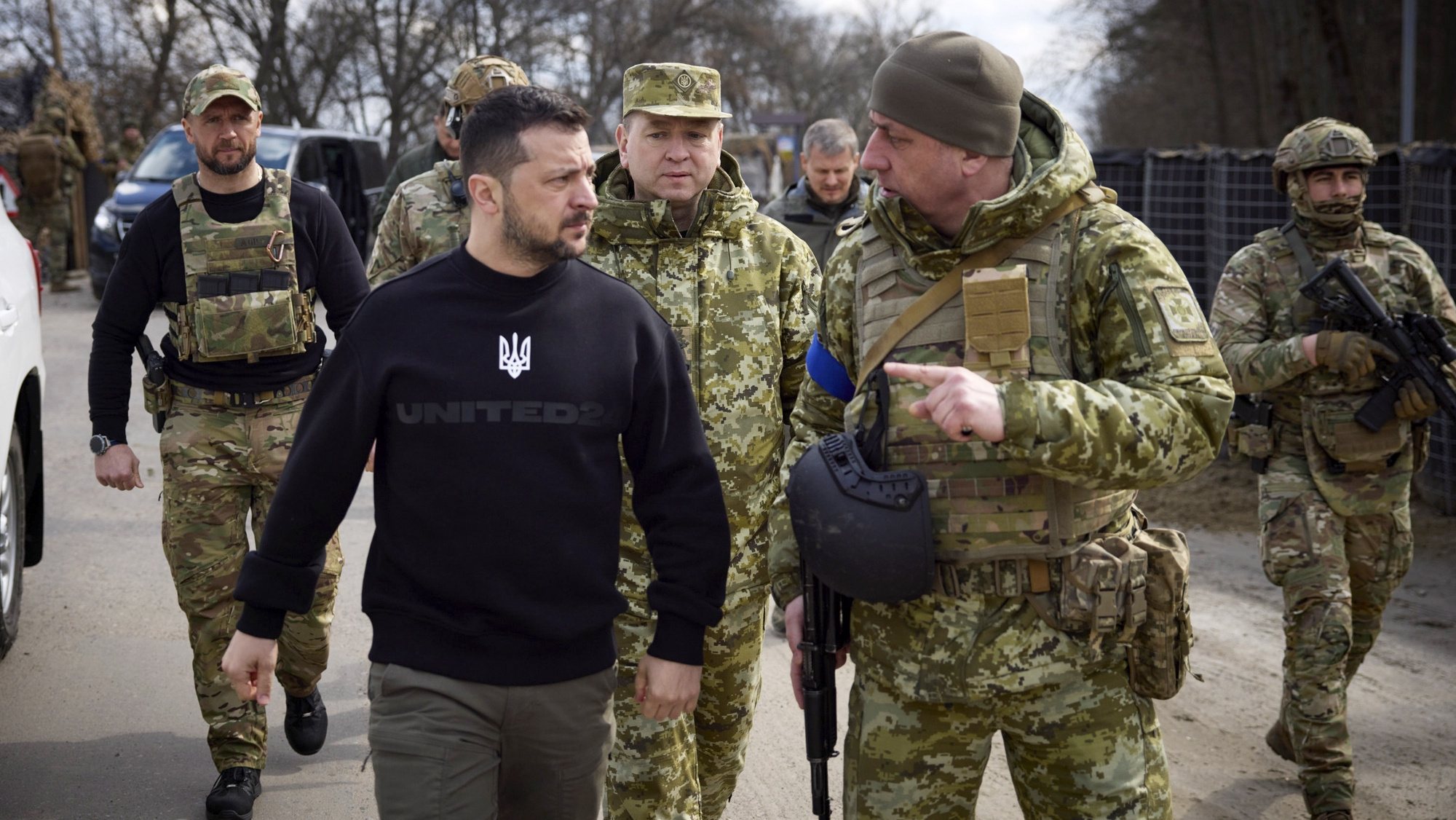 epa10547201 A handout photo made available by the Ukrainian Presidential Press Service shows Ukrainian President Volodymyr Zelensky (L) walking at an undisclosed position of Ukrainian frontier guards in the Sumy area, Ukraine, 28 March 2023. Zelensky inspected the units of the State Border Guard Service during his working visit to the border area with Russia. Russian troops on 24 February 2022, entered Ukrainian territory, starting a conflict that has provoked destruction and a humanitarian crisis.  EPA/PRESIDENTIAL PRESS SERVICE HANDOUT  HANDOUT EDITORIAL USE ONLY/NO SALES