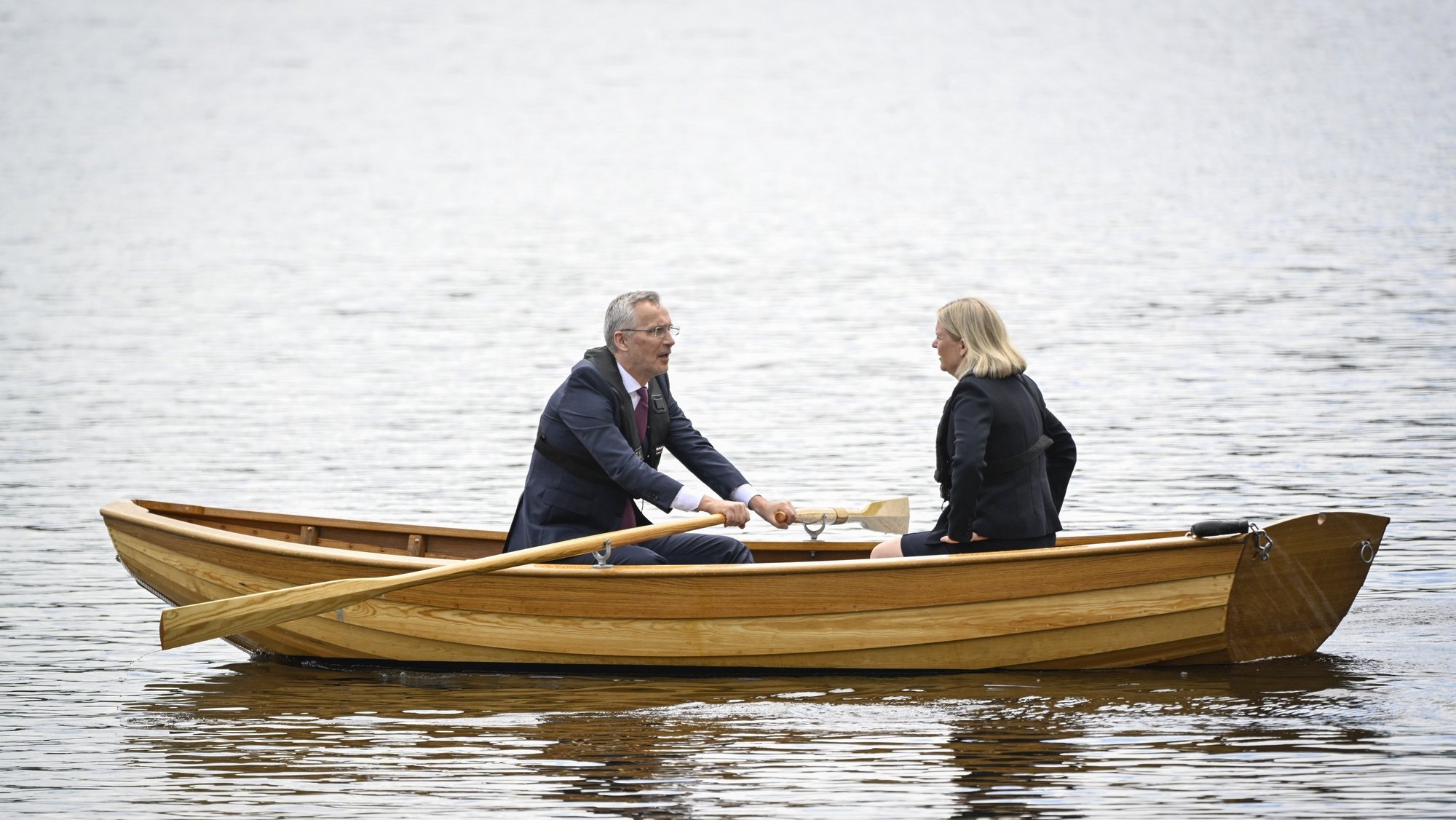 epa10010782 Sweden&#039;s Prime Minister Magdalena Andersson (R) and NATO Secretary General Jens Stoltenberg hold a meeting inside a traditional rowboat at Harpsund, the country retreat of the Swedish prime ministers, in Sweden, 13 June 2022.  EPA/Henrik Montgomery/TT SWEDEN OUT SWEDEN OUT