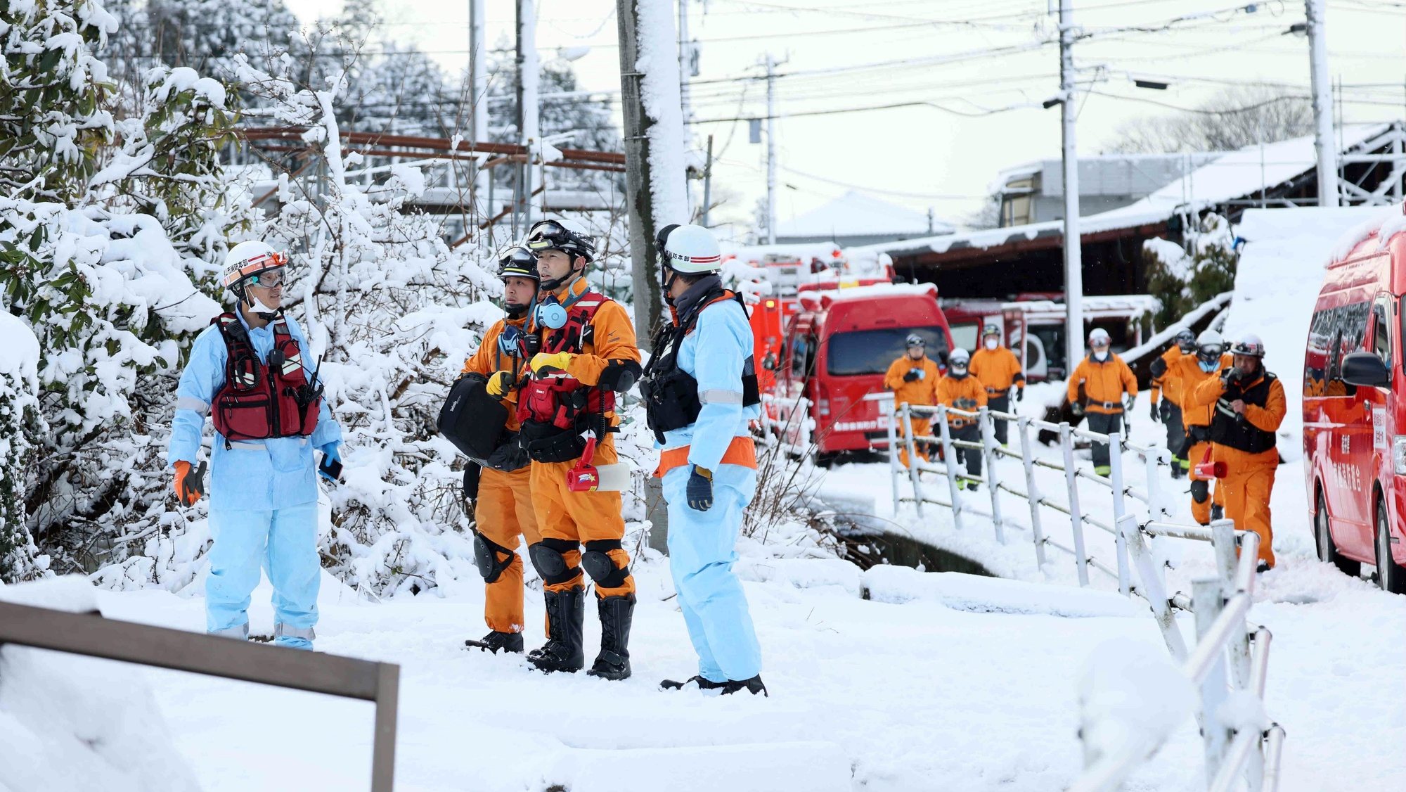 epa11064254 Firefighters search for missing persons under snowfall in Suzu, Ishikawa Prefecture, Japan, 08 January 2024. According to latest data by the Ishikawa Prefecture Government, at least 168 people were killed and 323 persons are still missing following a magnitude 7 earthquake (the USGS listed the earthquake as 7.6 magnitude) which occurred on 01 January. About 28,000 residents in Ishikawa Prefecture have evacuated to 355 makeshift evacuation centers.  EPA/JIJI PRESS JAPAN OUT EDITORIAL USE ONLY