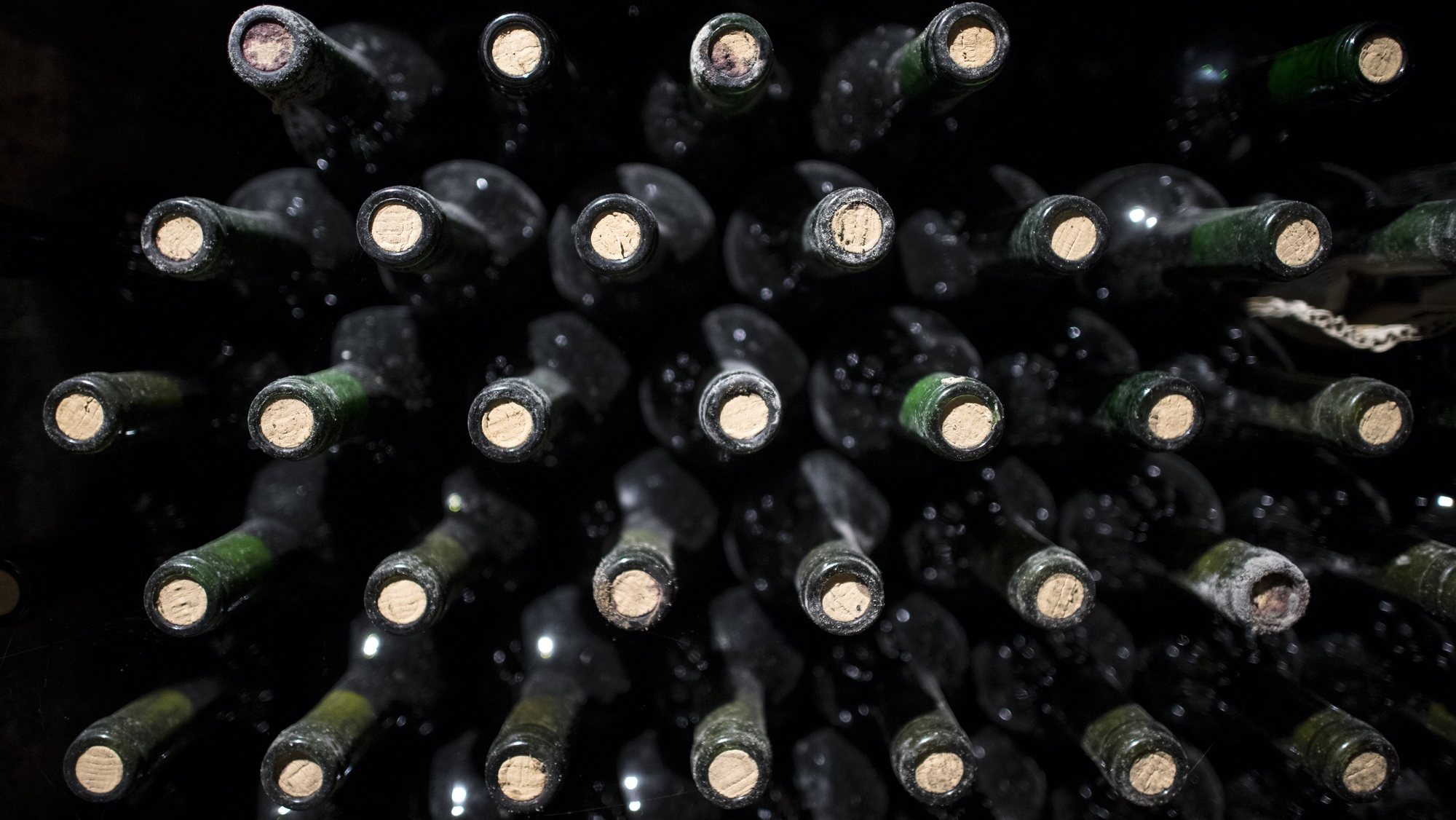 epa06321344 Bottles of wine are stacked in a wine cellar in Vienna, Austria, 10 November 2017. The Viennese wine growing region includes up to 700 hectare and a annually production of up to 20000 hectoliter.  EPA/CHRISTIAN BRUNA