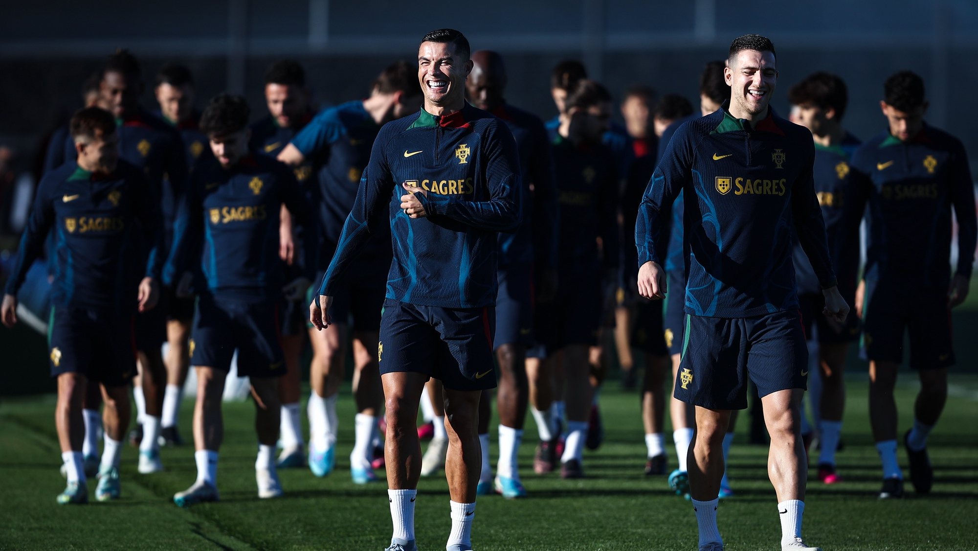 Portugal soccer team players Cristiano Ronaldo (L) and Diogo Dalot (R) during a training session at Cidade do Futebol in Oeiras, outskirts of Lisbon, Portugal, 21 March 2023. Portugal will play his Euro 2024 Group J qualifying soccer match with Liechtenstein next Thursday at Alvalade Stadium in Lisbon. RODRIGO ANTUNES/LUSA