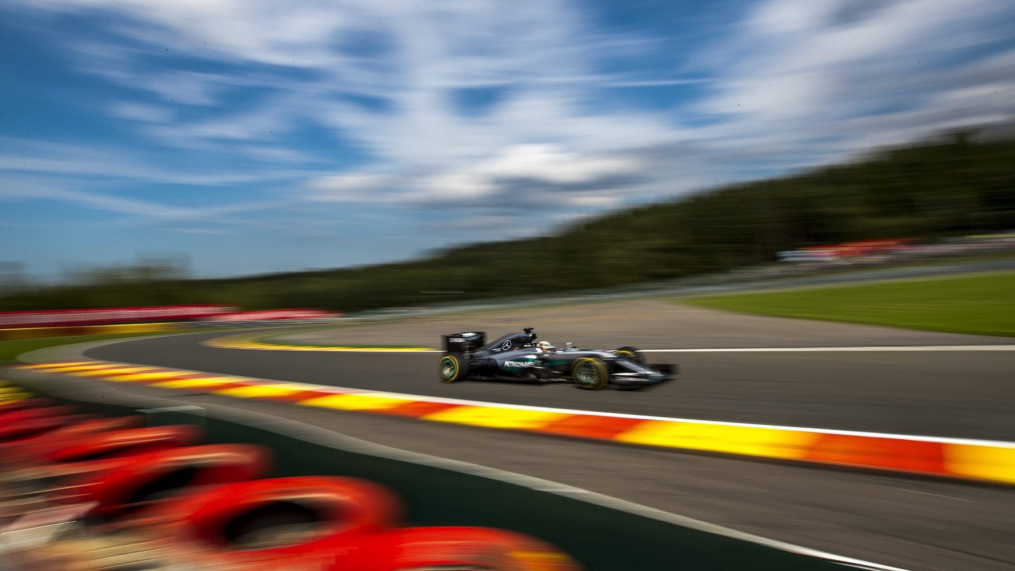 epa05529701 (FILE) A file photo dated 26 August 2016 of British Formula One driver Lewis Hamilton of Mercedes AMG GP in action during the second practice session for the 2016 Belgium Formula One Grand Prix at the Spa-Francorchamps race track near Francorchamps, Belgium. Media reports on 08 September 2016 state that US media group Liberty Media, owned by US billionaire John Malone, plans to buy the Formula One racing business. After purchasing a minority stake in a first step, Liberty Media will finalize the full deal worth an estimate 4.4 billion US dollars, pending the approval of regulators.  EPA/SRDJAN SUKI
