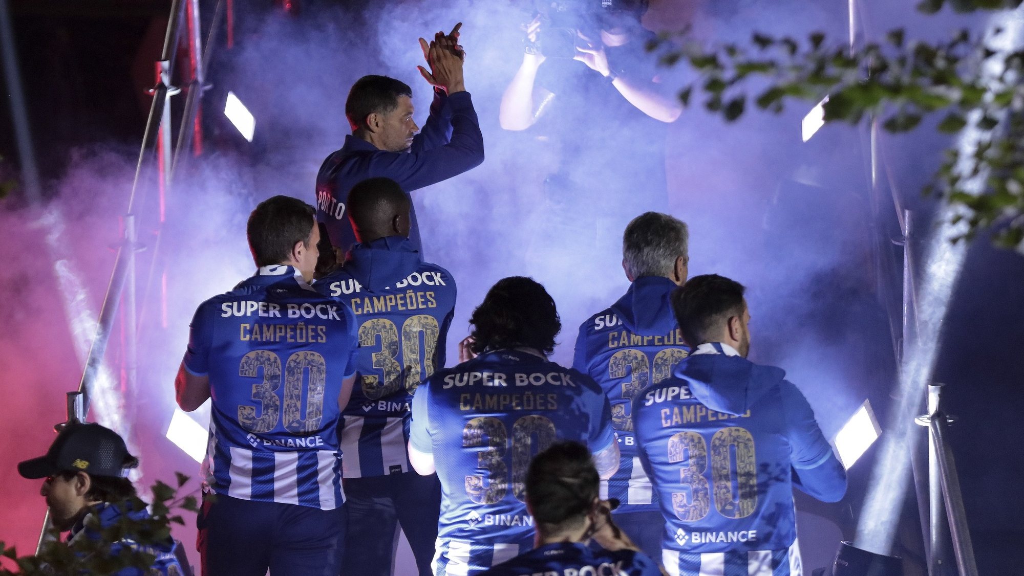 FC Porto head coach Sergio Conceicao (L) and his players celebrate with fans the conquest of the 30 title of the portuguese soccer first league at Dragao stadium, Porto, Portugal, 08 May 2022. FC Porto became Portuguese football champions for the 30th time today, beating Benfica 1-0 at home, in the 33rd and penultimate round of the I League. MANUEL FERNANDO ARAUJO/LUSA