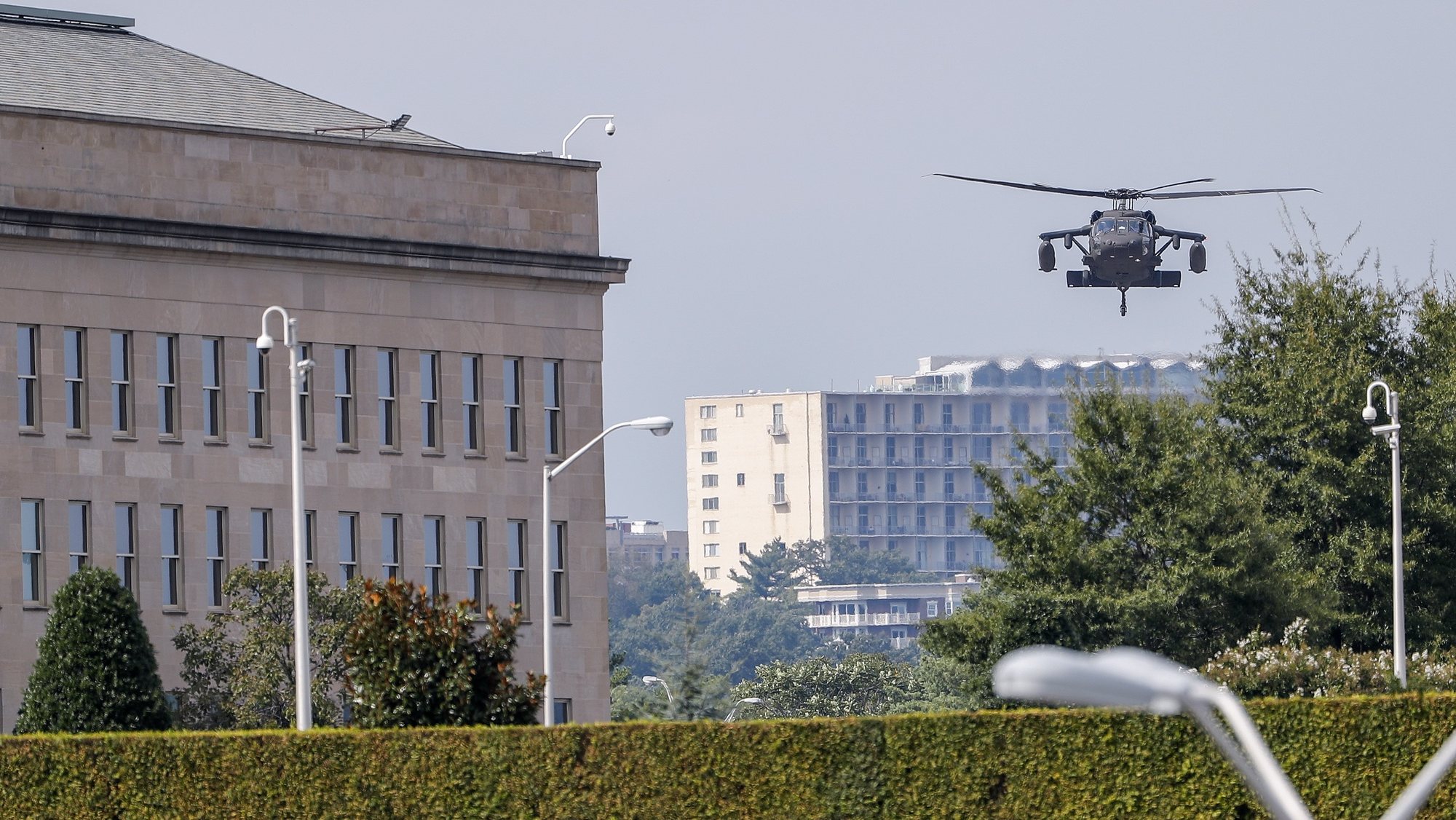 epa07064640 A military helicopter lands outside the Pentagon building in Arlington, Virgina, USA, 02 October 2018. Two pieces of mail delivered to the Pentagon mail facility on 02 October have initially tested positive for ricin, according to US defense officials.  EPA/ERIK S. LESSER