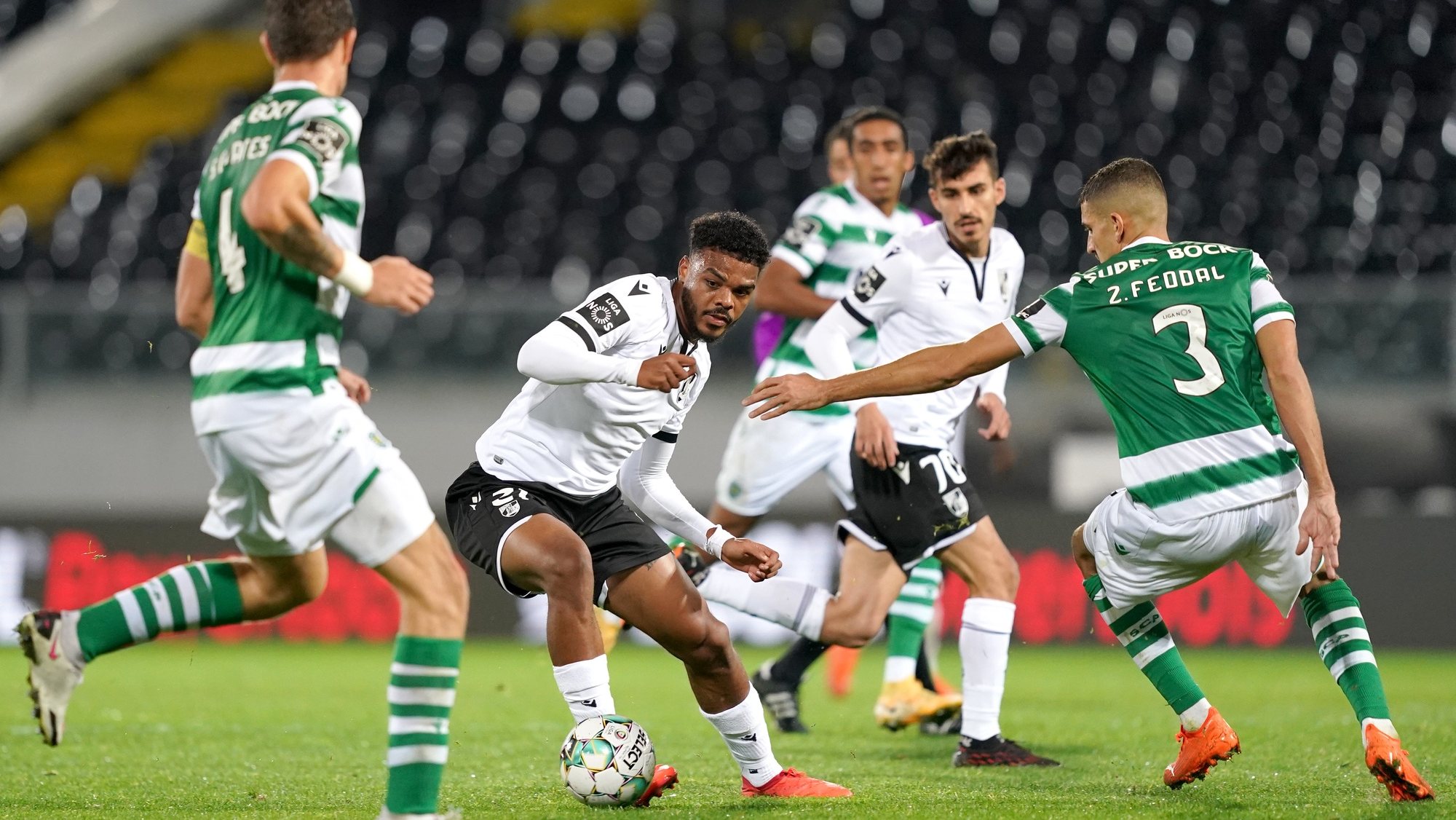Vitoria de Guimaraes´s Lyle Foster (2-L) vies for the ball with Sporting´s Zouhair Feaal (R) during their Portuguese First League soccer match held at D. Afonso Henriques stadium in Guimaraes, Portugal, 07 November 2020. HUGO DELGADO/LUSA