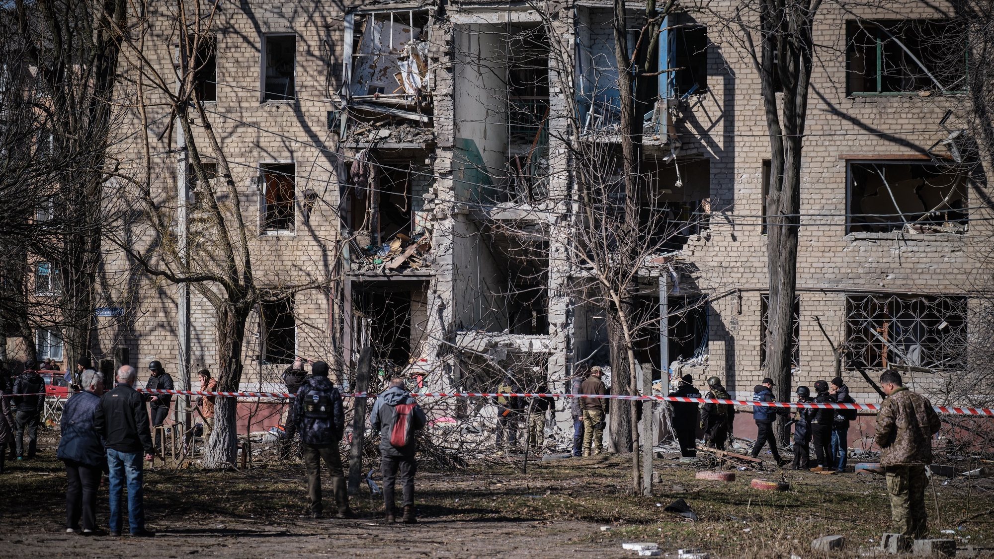 epa10521883 Emergency services on the scene following a Russian missile strike on a residential building in Kramatorsk, Donetsk region, Ukraine, 14 March 2023. According to the Ukrainian Prosecutor Generals office, one person was killed and three wounded in the incident. Russian troops entered Ukraine on 24 February 2022 starting a conflict that has provoked destruction and a humanitarian crisis.  EPA/YEVGEN HONCHARENKO