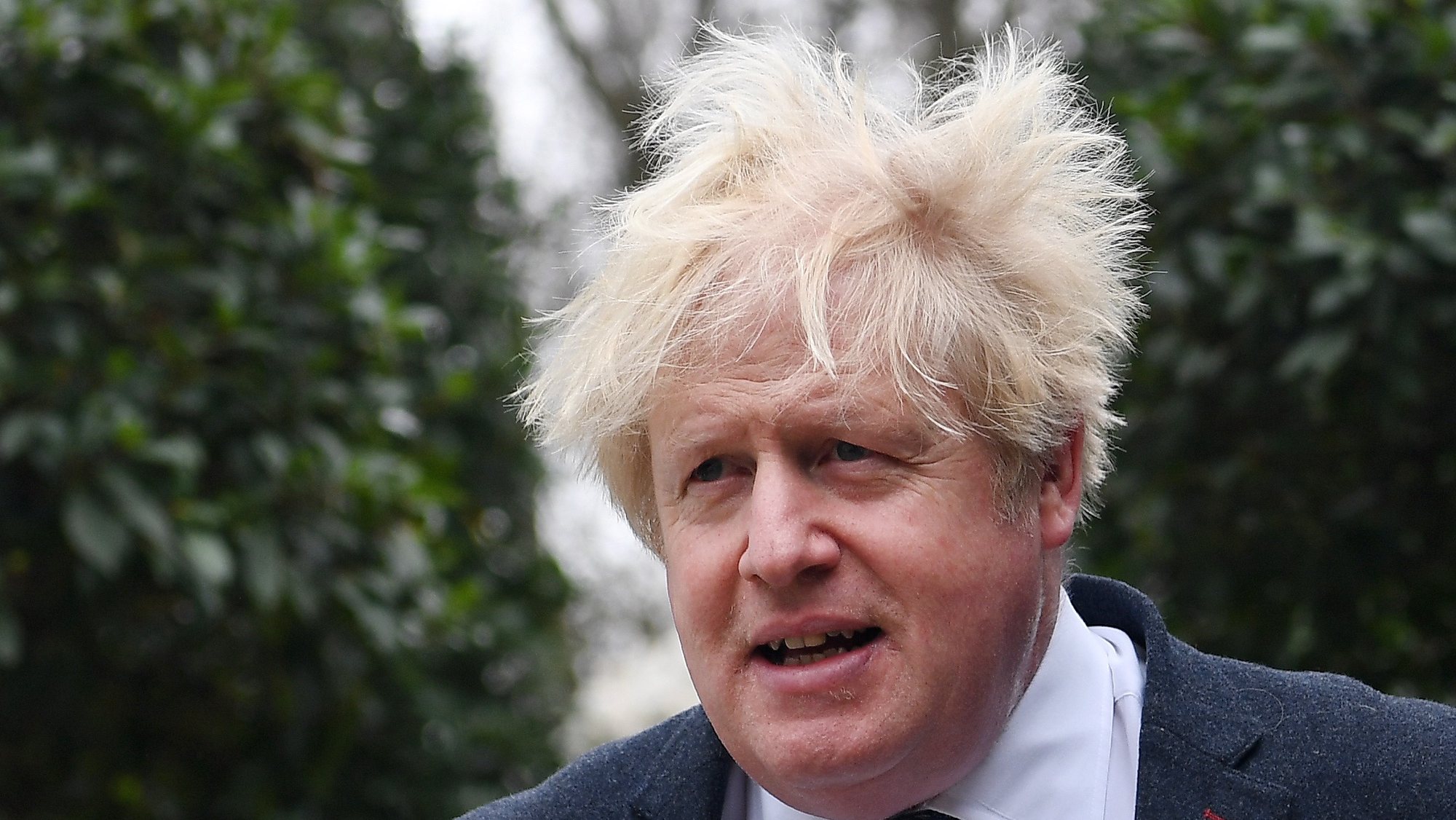 epa10534790 Former British Prime Minister Boris Johnson outside his home in London, Britain, 21 March 2023. Johnson is set to give evidence to MPs who are investigating accusations that he misled Parliament over Partygate, on 22 March.  EPA/ANDY RAIN