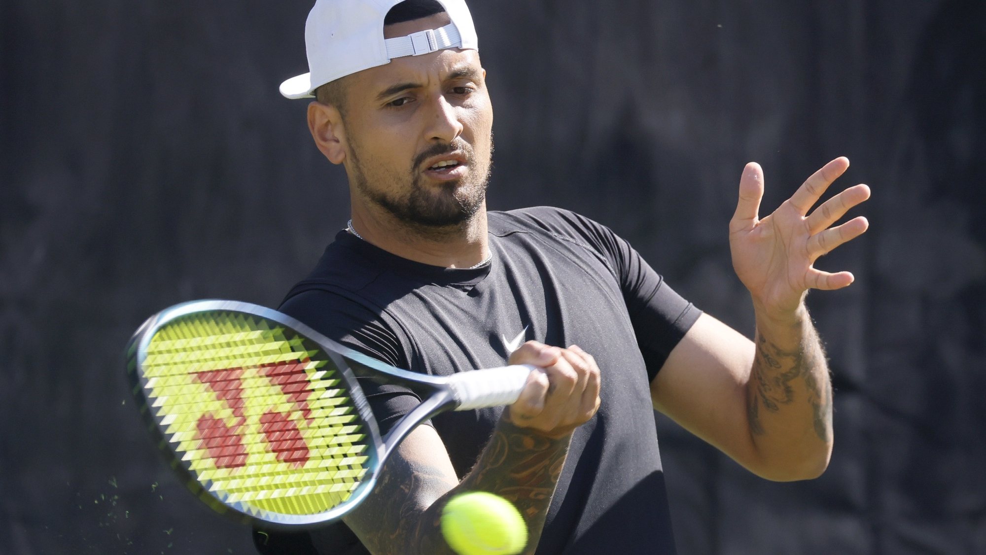 epa10688814 Nick Kyrgios of Australia in action during his first round match against Yibing Wu of China at the ATP Boss Open tennis tournament in Stuttgart, Germany, 13 June 2023.  EPA/RONALD WITTEK