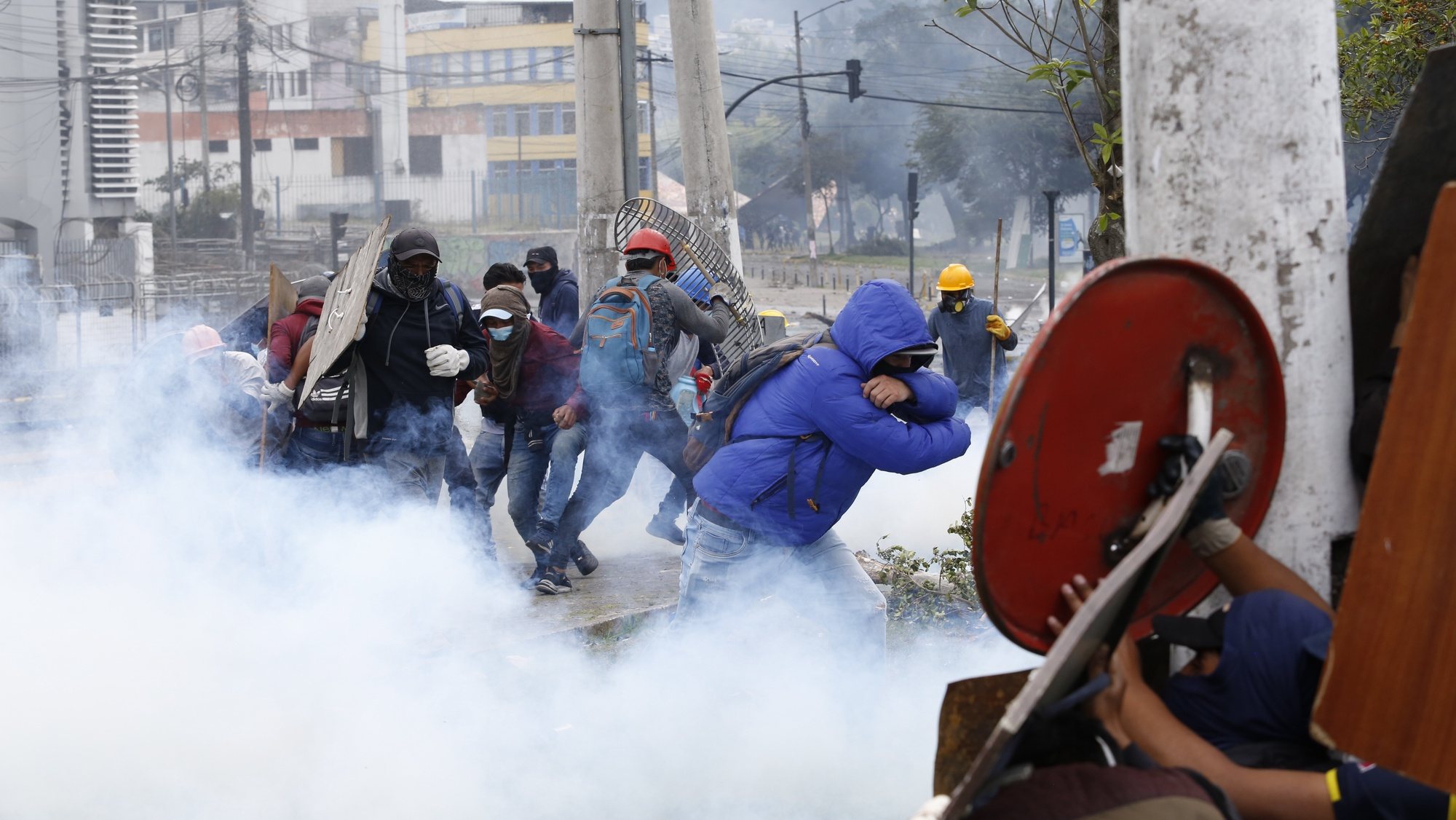 epaselect epa10032771 Demonstrators clash with riot police during the twelfth day of protests against the Government of Guillermo Lasso, in Quito, Ecuador, 24 June 2022. The Confederation of Indigenous Nationalities of Ecuador (Conaie), the main promoter of the protests against the Government due to the high cost of living, convened this Friday a &#039;popular assembly&#039; in the agora of the House of Ecuadorian Culture, to listen to the positions, requests and proposals from different sectors about the country&#039;s situation.  EPA/Santiago Fernandez