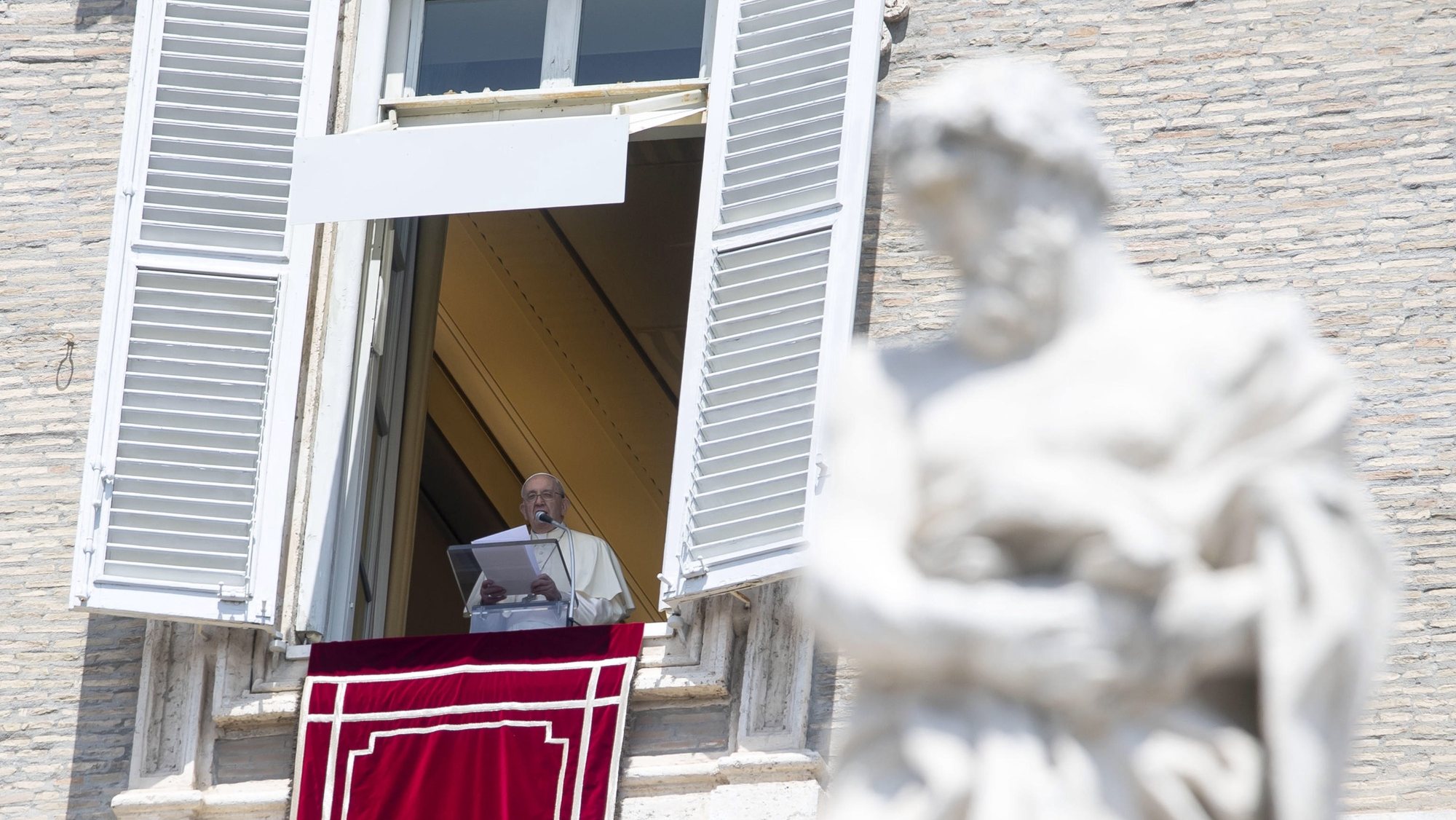 epa09965389 Pope Francis celebrates Sunday Angelus Prayer from the window of his office overlooking Saint Peter&#039;s Square at the Vatican, 22 May 2022.  EPA/ANSA/MASSIMO PERCOSSI