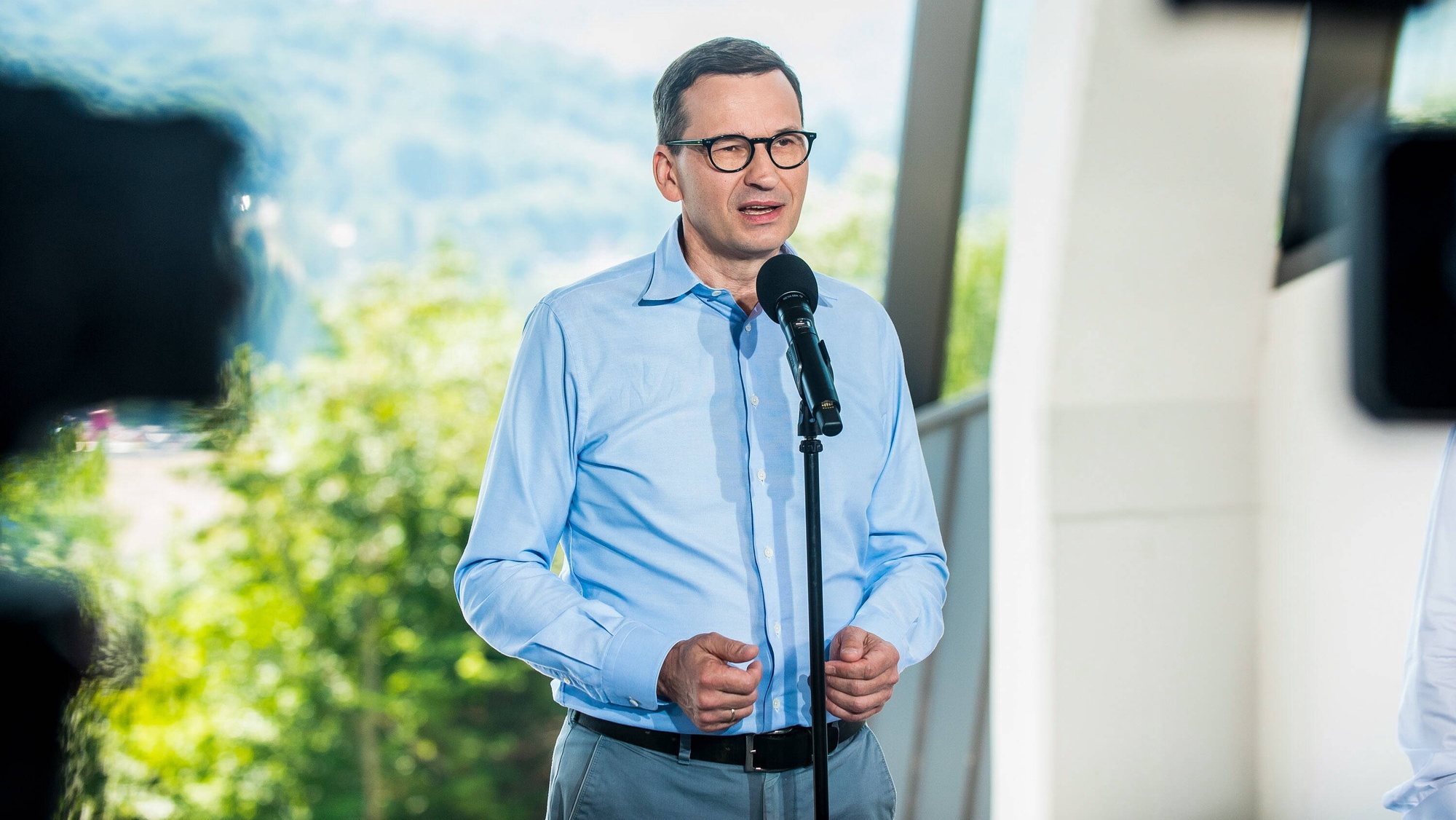 epa10046099 Polish Prime Minister Mateusz Morawiecki speaks during the opening of the gondola lift in Solina, Poland, 01 July 2022. The length of the cable railway is 1600 meters, from the Plasza station to the Jawor station, where the observation tower and the theme park are situated.  EPA/Art Service 2 POLAND OUT