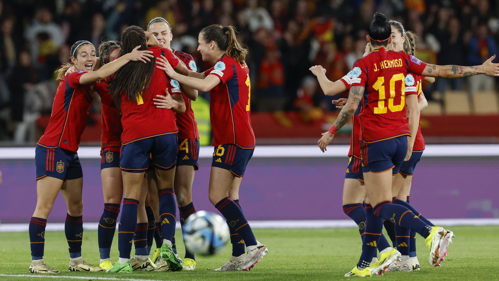 epa11187324 Players of Spain celebrate scoring the 2-0 goal during the UEFA Women&#039;s Nations League final soccer match between Spain and France, in Seville, Spain, 28 February 2024.  EPA/Julio Munoz