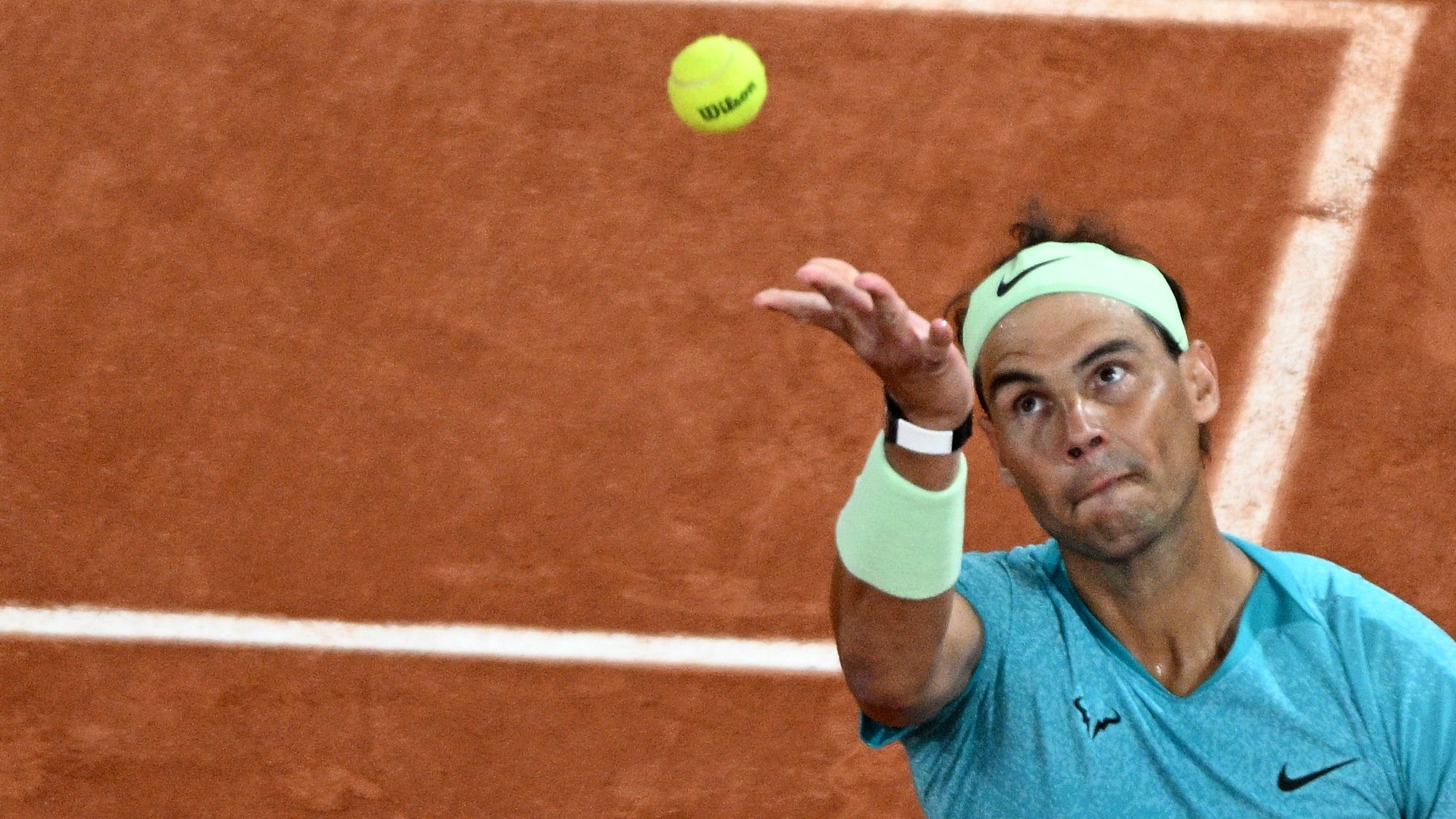 epa11374173 Rafael Nadal of Spain in action during his Men&#039;s Singles 1st round match against Alexander Zverev of Germany during the French Open Grand Slam tennis tournament at Roland Garros in Paris, France, 27 May 2024.  EPA/CAROLINE BLUMBERG
