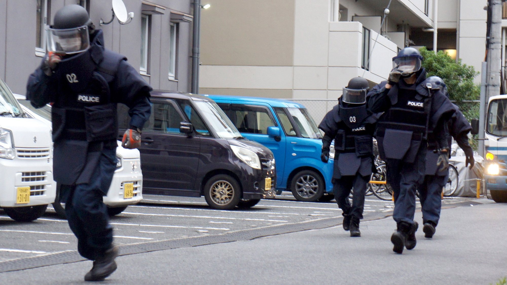 epa10059519 Riot policemen leave the house of suspect Tetsuya Yamagami following a search in Nara, western Japan, 08 July 2022. The suspect of assassinating former Japanese pime minister Abe, identified as Tetsuya Yamagami, was arrested and taken into custody. According to Japan&#039;s national broadcaster, former Prime Minister Shinzo Abe died of his injuries on 08 July 2022, hours after being shot during an Upper House election campaign act to support a party candidate, outside Yamato-Saidaiji railway station in Nara, western Japan.  EPA/JIJI PRESS JAPAN OUT EDITORIAL USE ONLY/