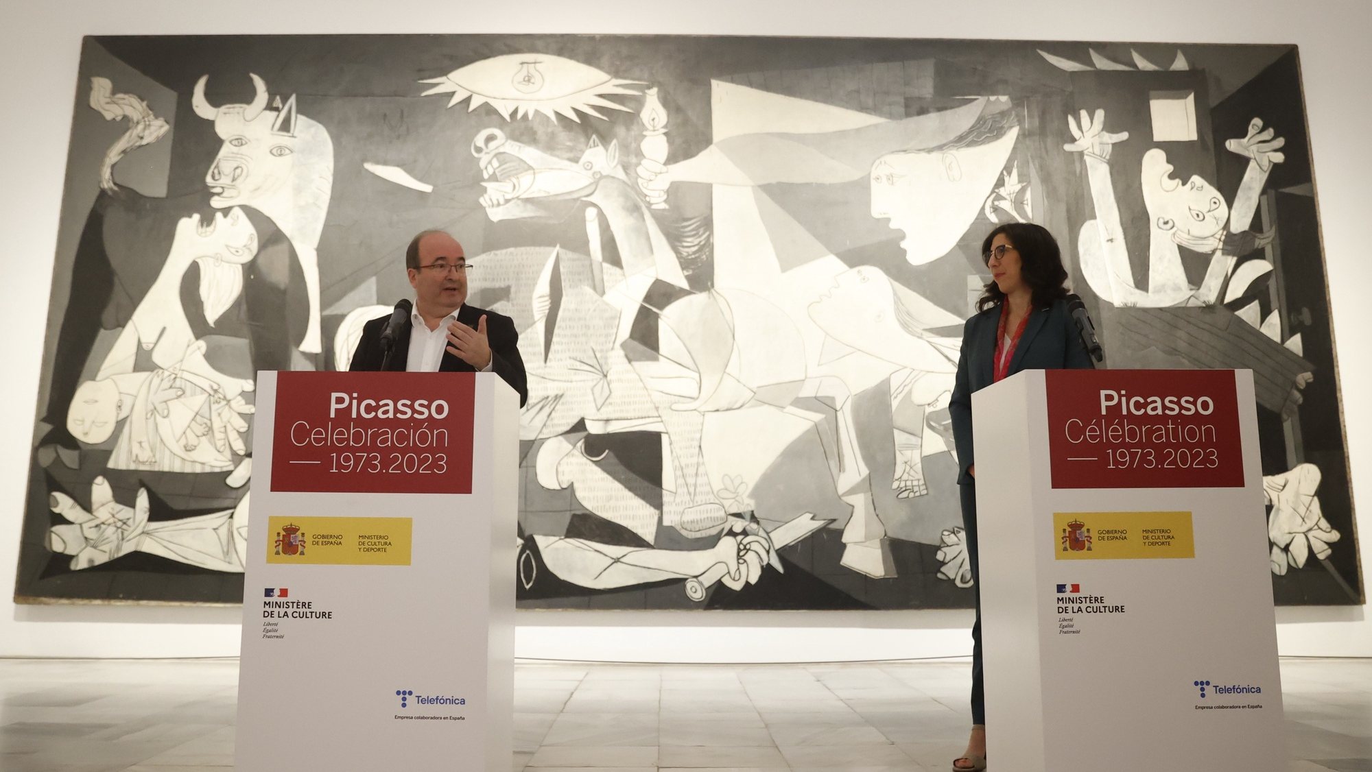 epa10179360 Spanish Culture Minister Miquel Iceta (L) and his French counterpart, Rima Abdul Malak (R), hold a joint press conference in front of Picasso&#039;s Guernica during the presentation of the events organized to mark the upcoming 50th anniversary of Picasso&#039;s death, at Reina Sofia Museum, in Madrid, Spain, 12 September 2022. The Spanish painter died on 08 April 1973 in France.  EPA/JUAN CARLOS HIDALGO